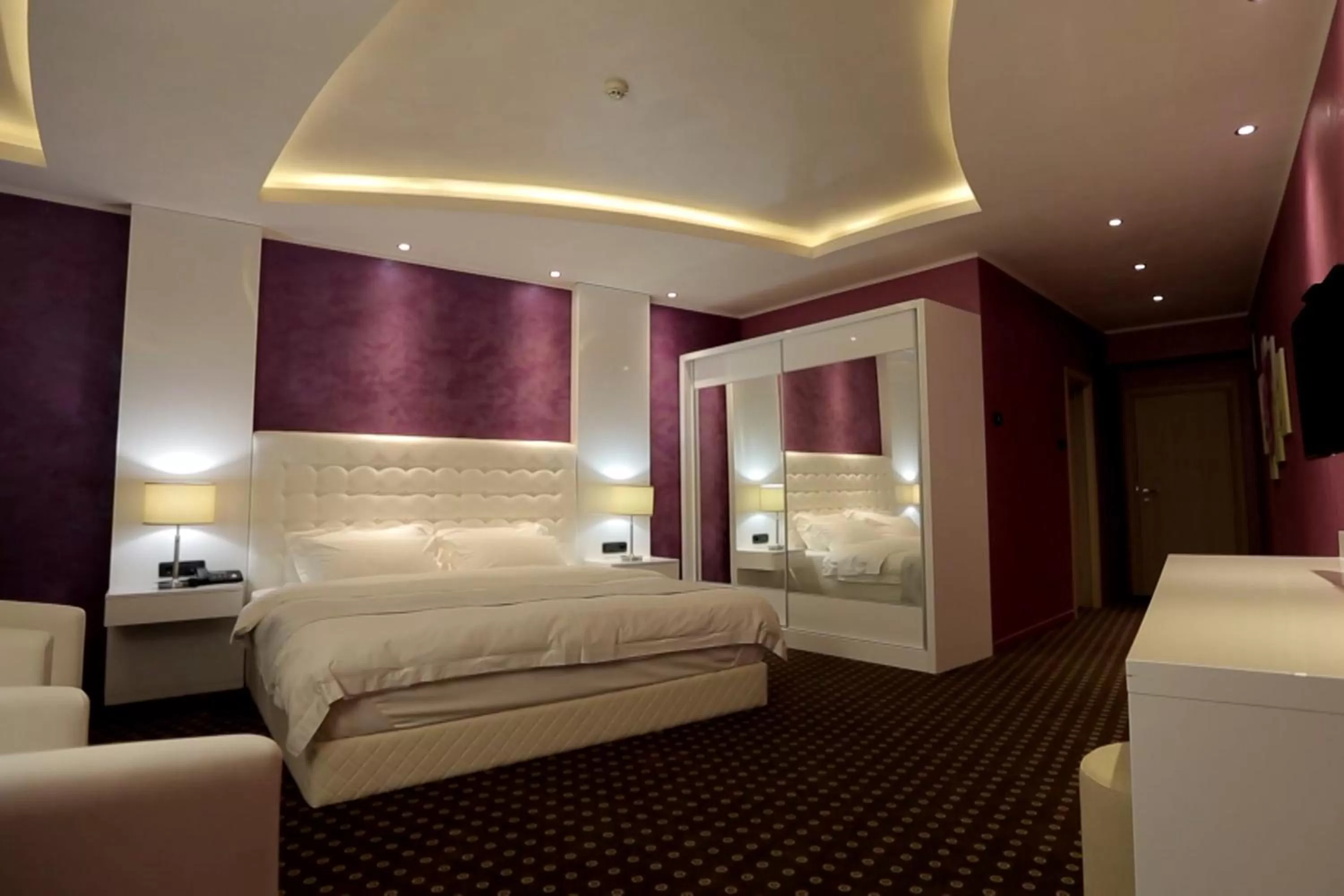 Bed in Orbis Design Hotel & Spa