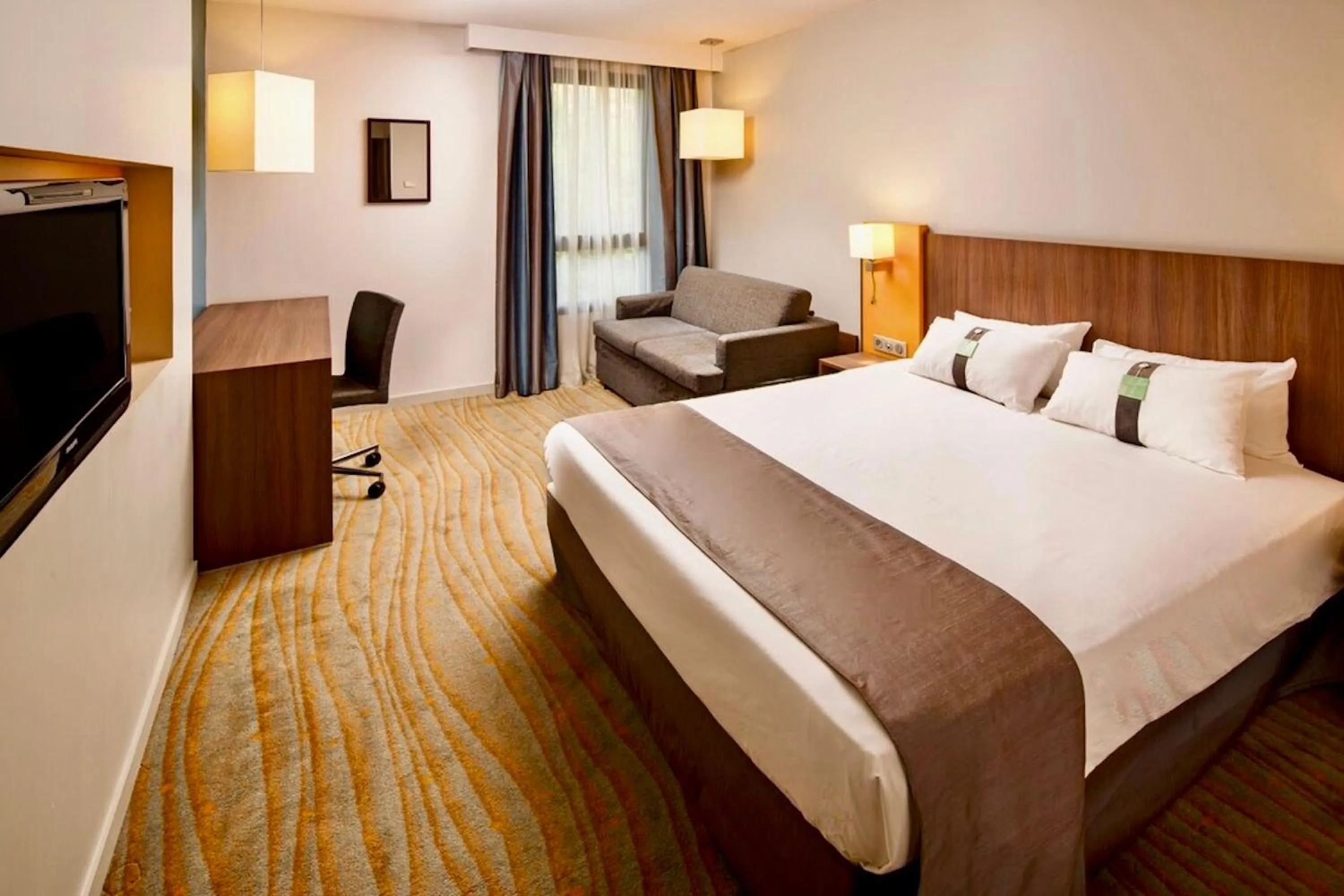 Photo of the whole room, Bed in Holiday Inn Lyon Vaise by IHG