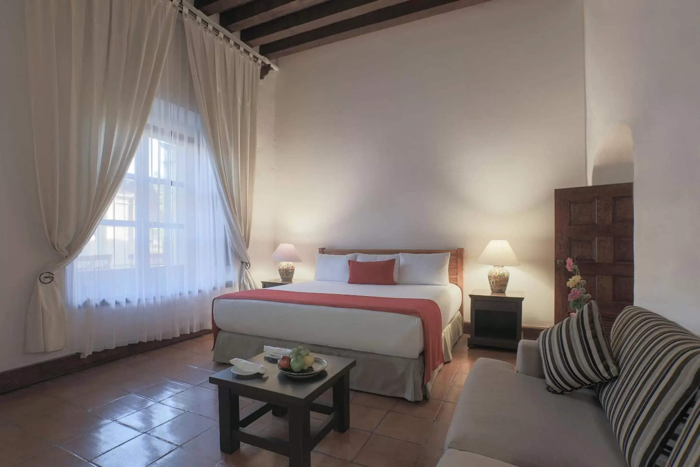 Photo of the whole room, Bed in Quinta Real Oaxaca