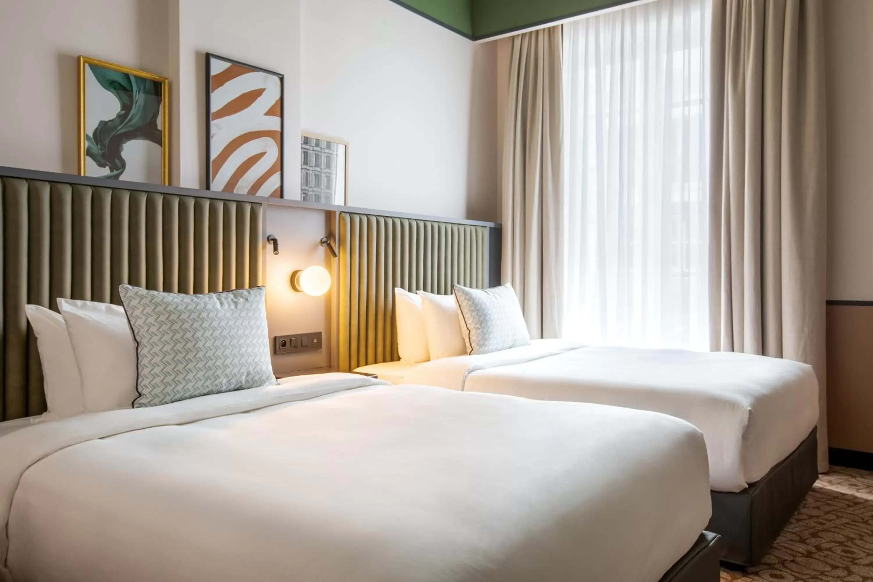 Bed in Le Parchamp, Paris Boulogne, a Tribute Portfolio Hotel