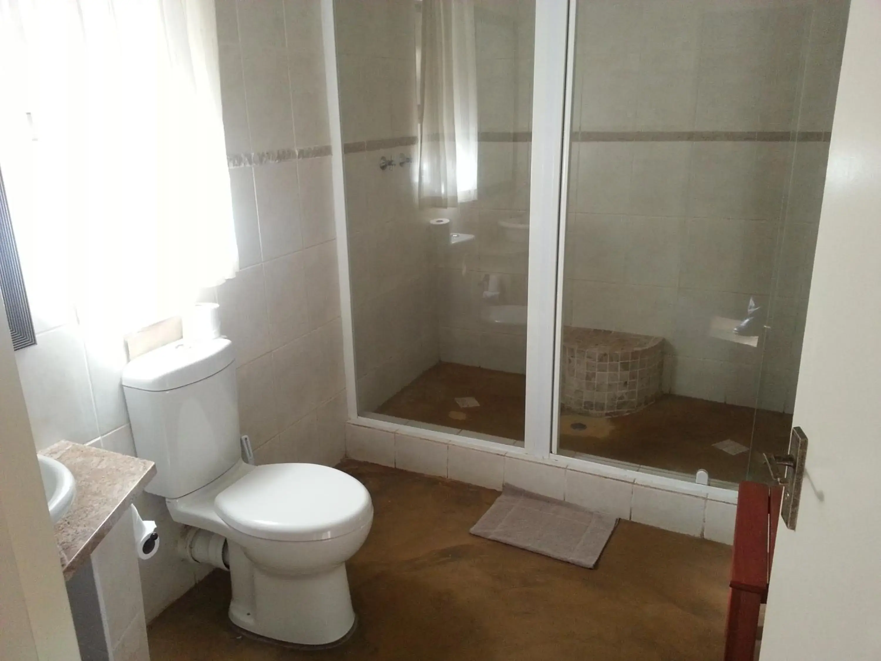 Toilet, Bathroom in eBundu Lodge