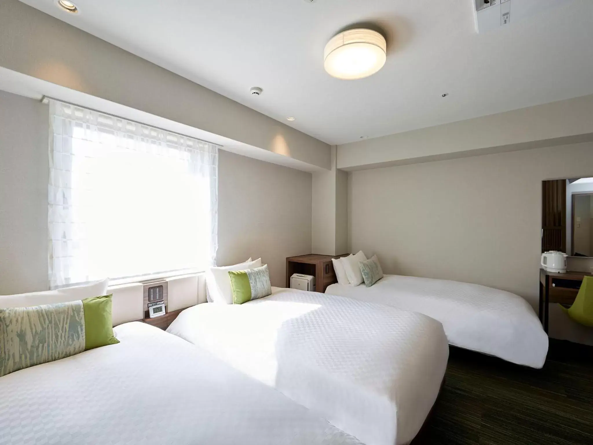 Photo of the whole room, Bed in Hearton Hotel Shinsaibashi Nagahoridouri