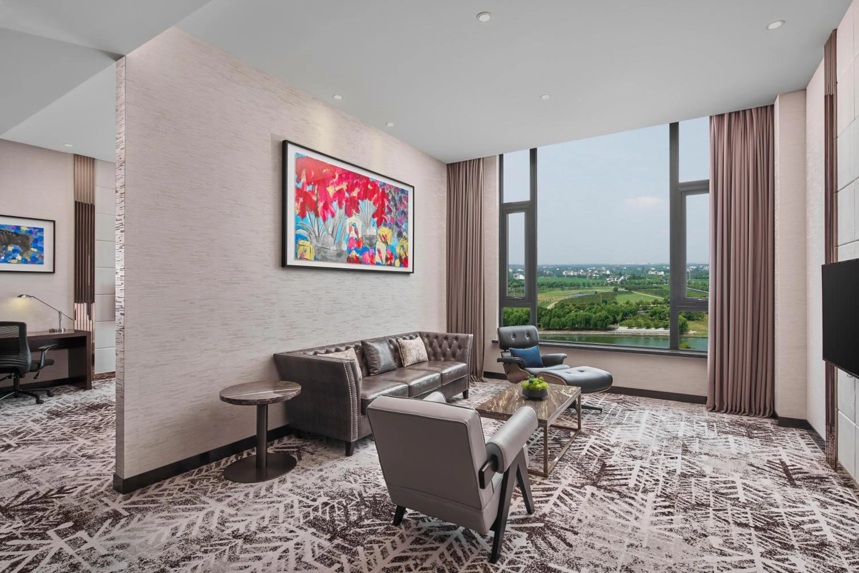 Living room in Crowne Plaza Shanghai Jinshan by IHG