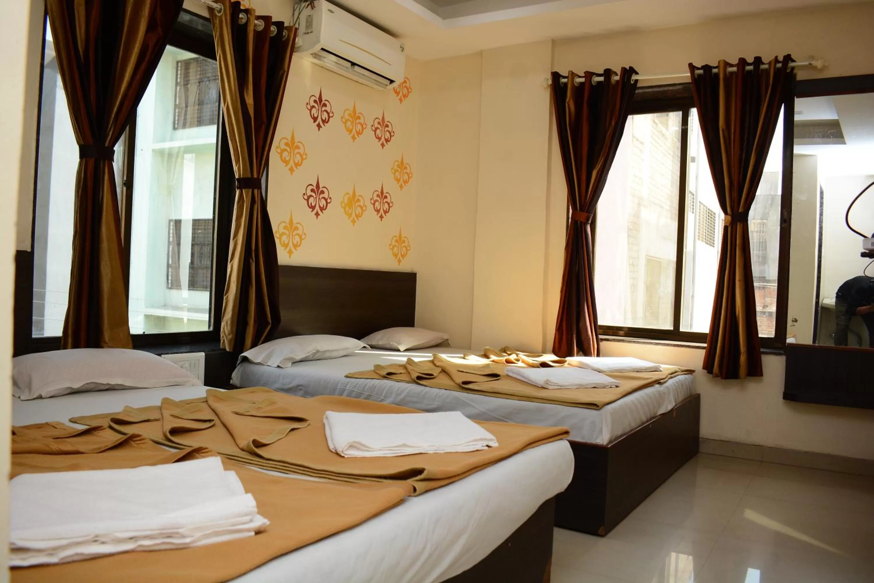 Photo of the whole room, Bed in Hotel Sai Sampada NX