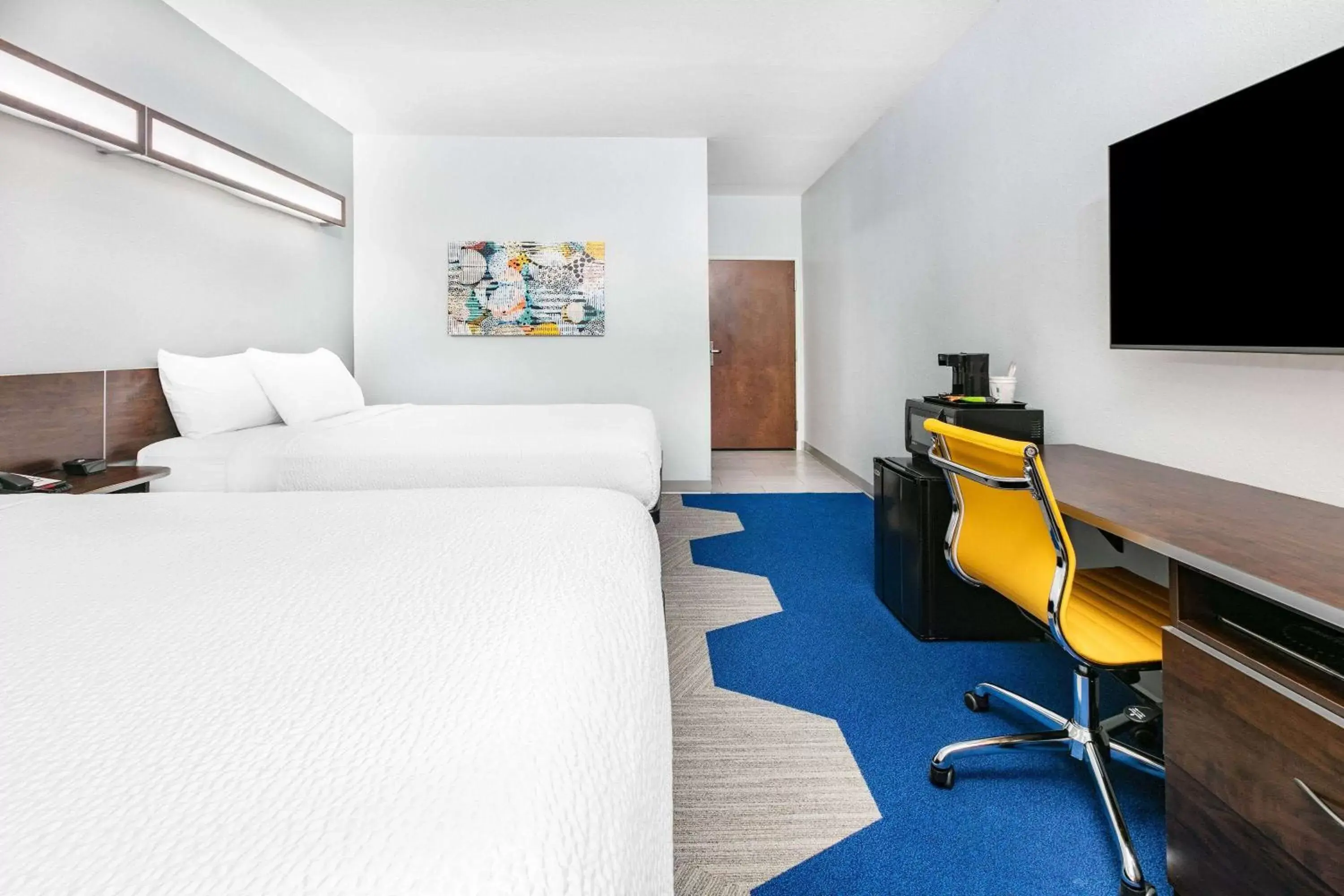 Bed in Microtel Inn & Suites by Wyndham Austin Airport