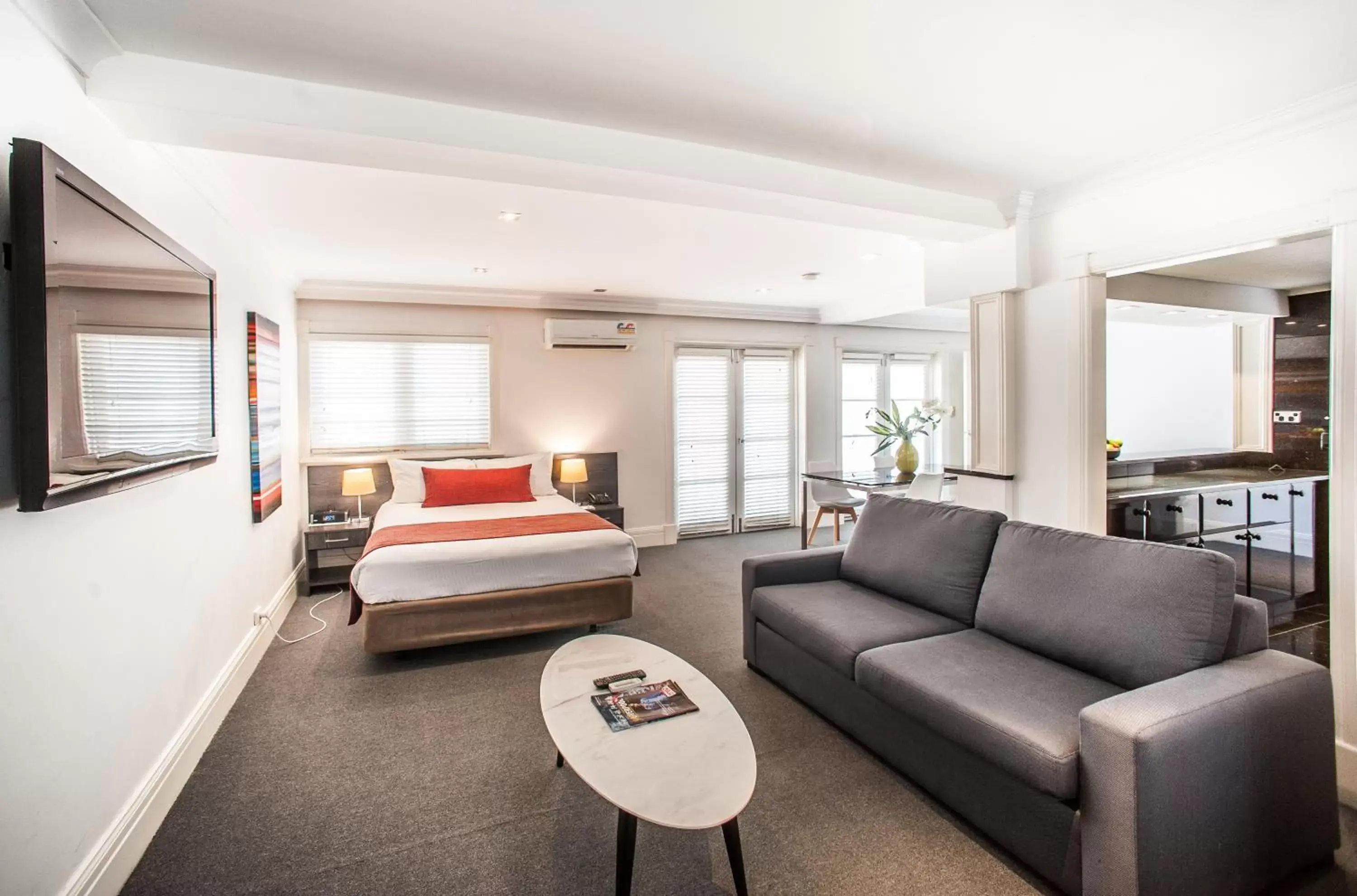Living room in Ramada Hotel & Suites by Wyndham Cabramatta