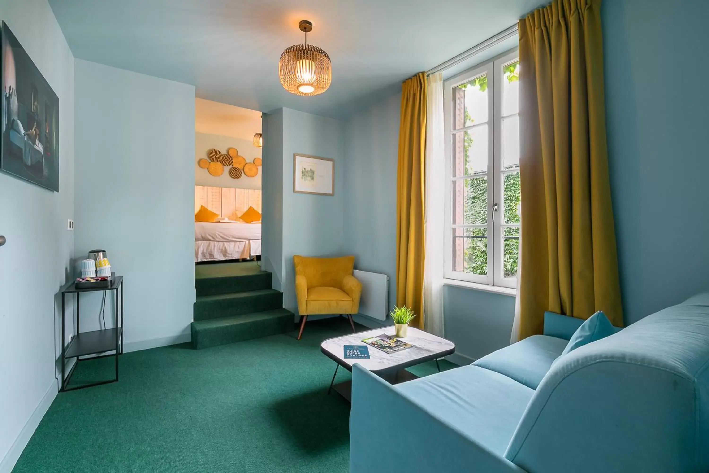 Bedroom, Seating Area in Le Central Boutique Hôtel