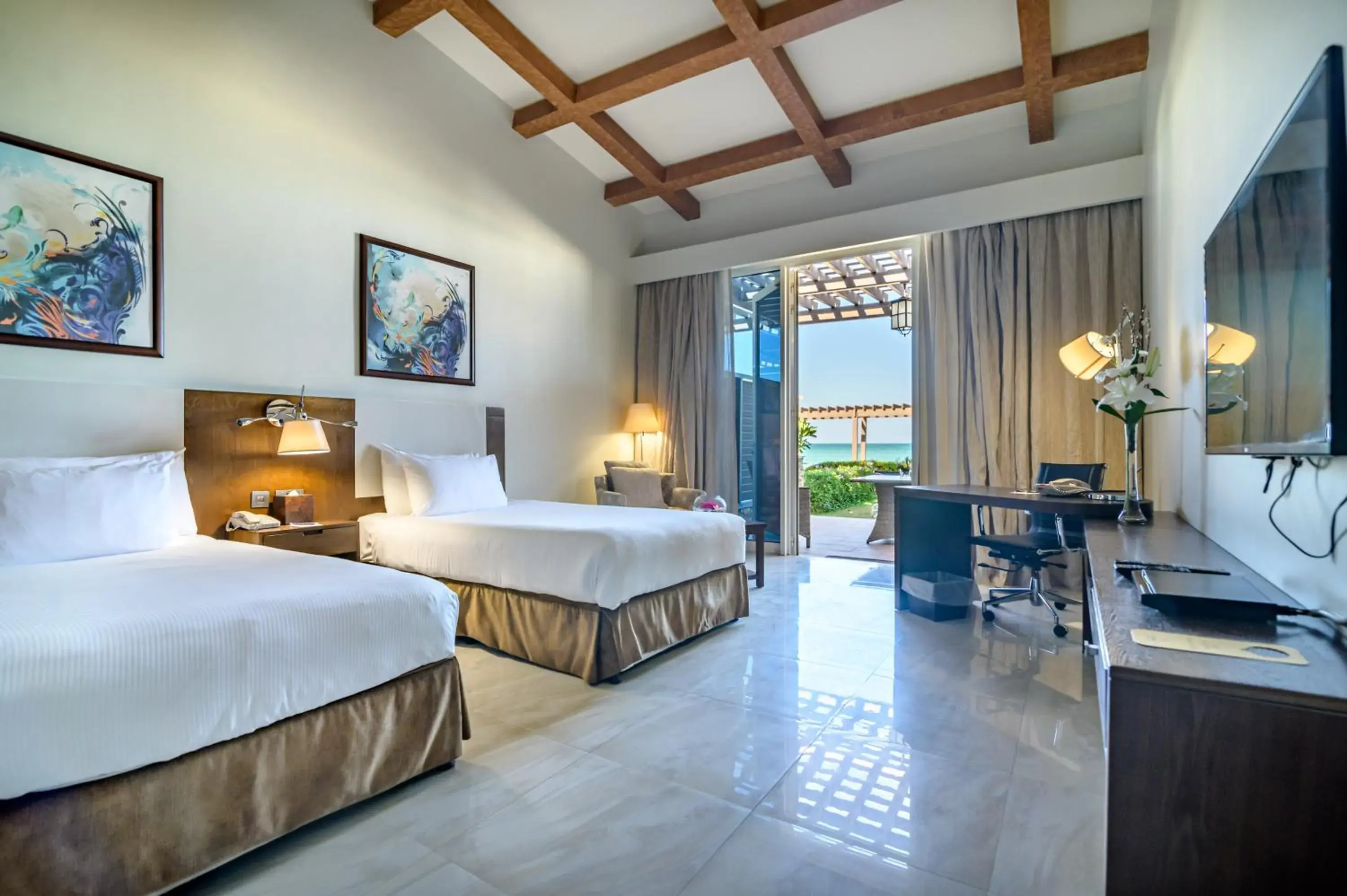 Premium Beachfront chalet double room with two beds with Garden, private terrace and parking in Danat Jebel Dhanna Resort Premium Beachfront chalet double room with two beds with Garden, private terrace and parking in Danat Jebel Dhanna Resort