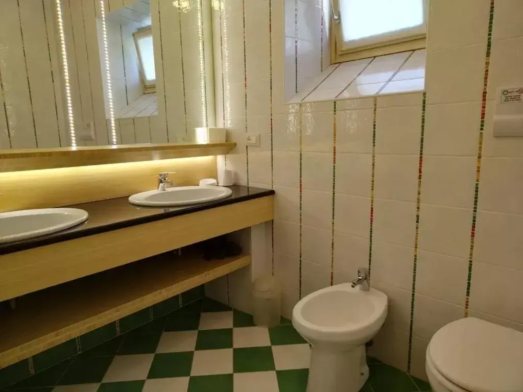 Bathroom in Borgo al Sole by Garda Facilities