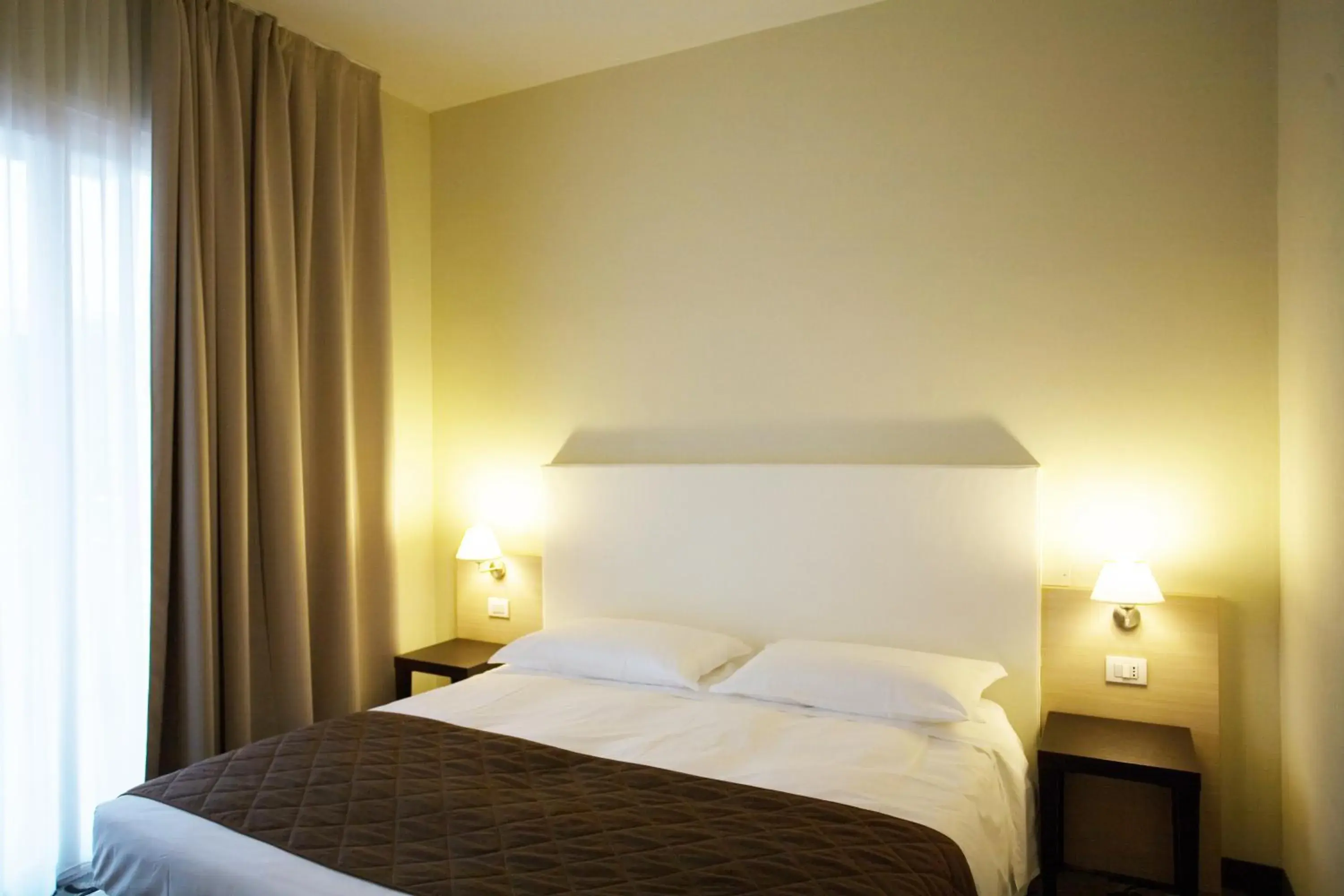 Bed in Regal Hotel & Residence