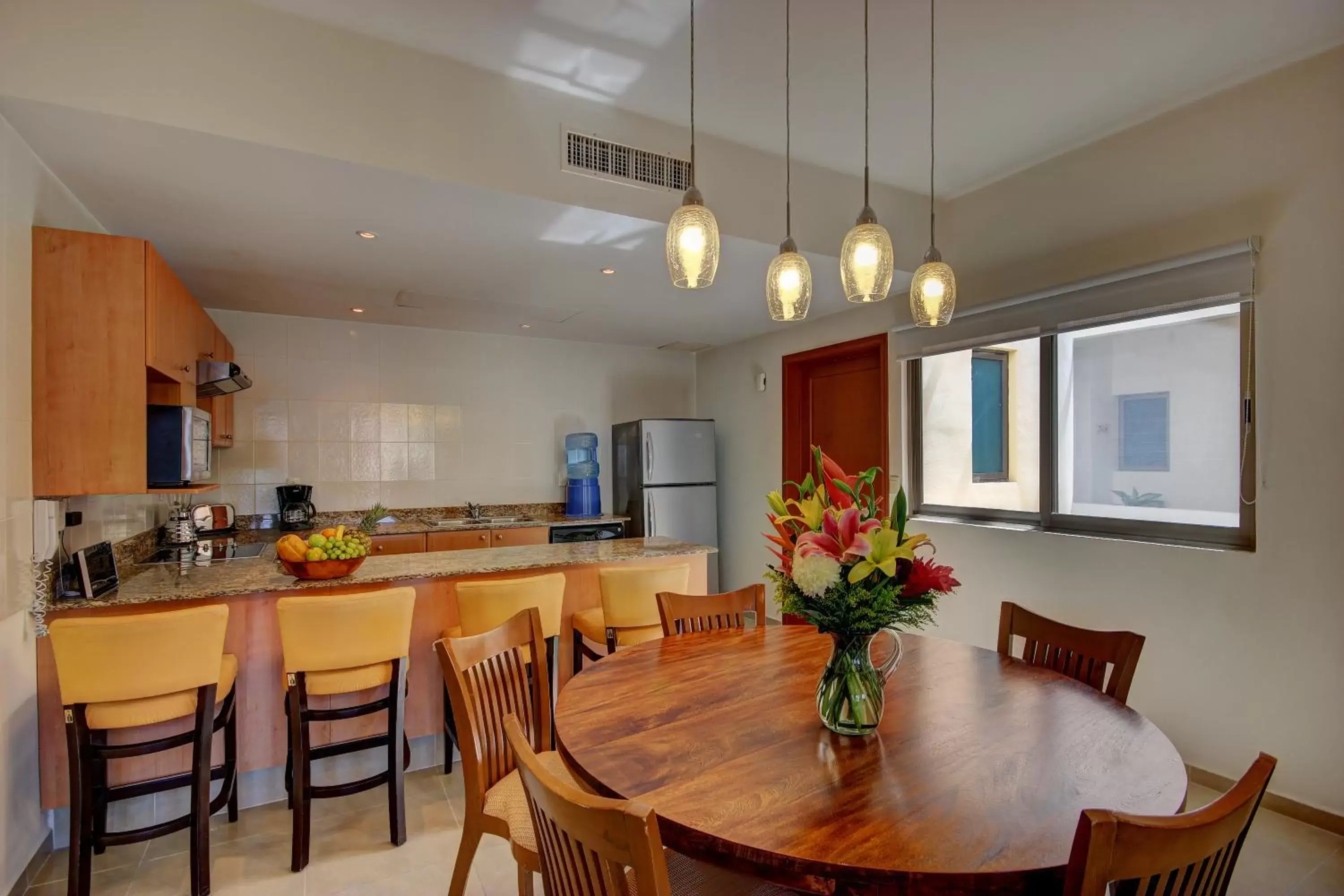Kitchen or kitchenette, Dining Area in Riviera Maya Suites