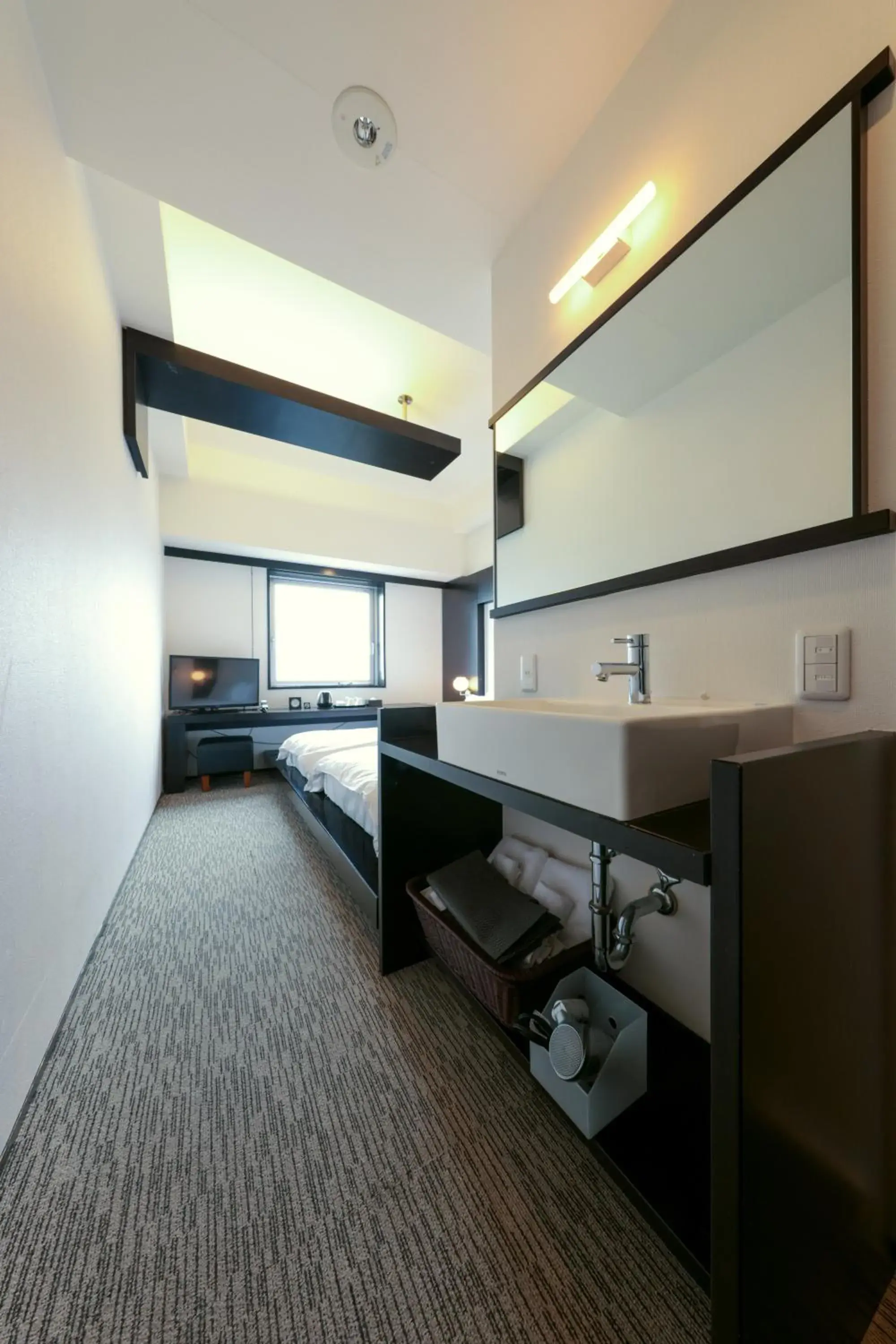 Bedroom in Furano Natulux Hotel