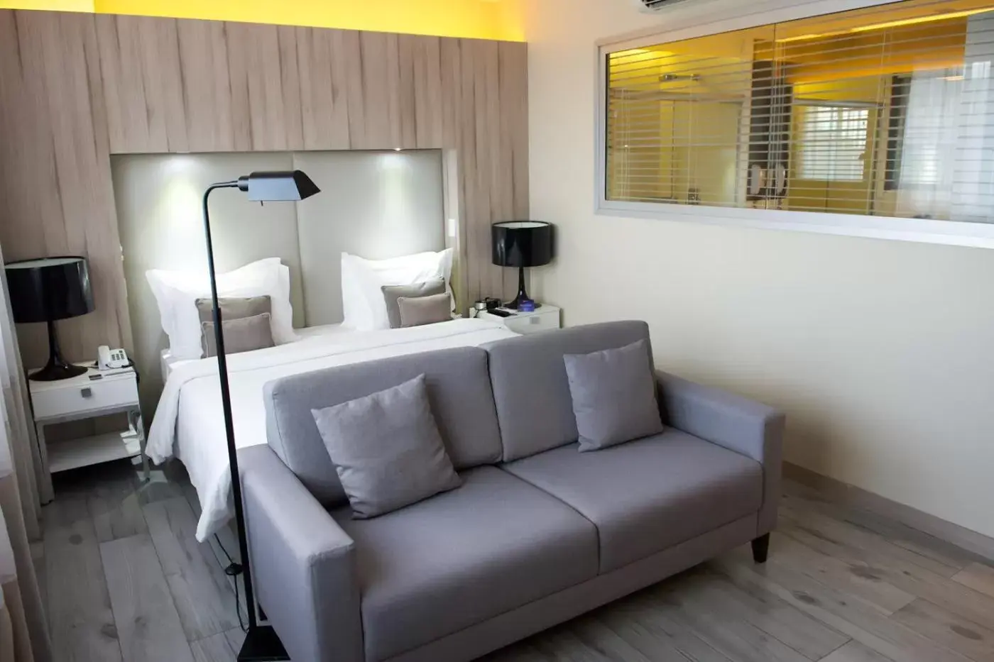 Bedroom, Seating Area in Radisson Blu Belo Horizonte Savassi