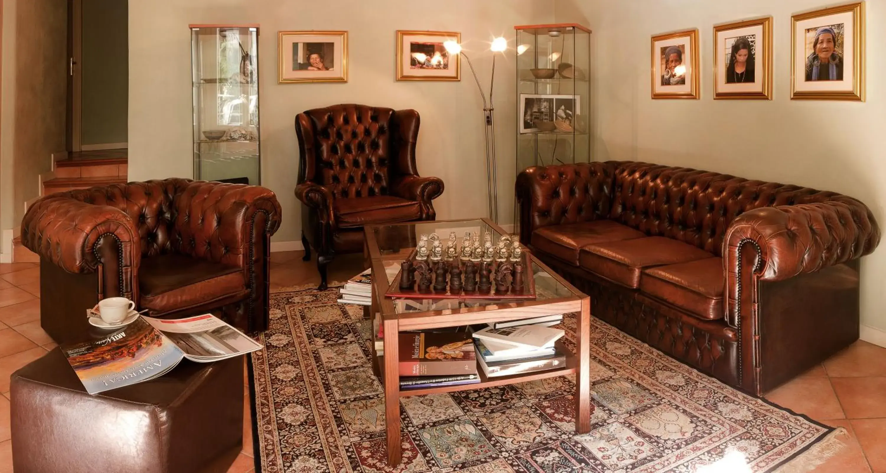 Communal lounge/ TV room, Seating Area in Albergo Orologio