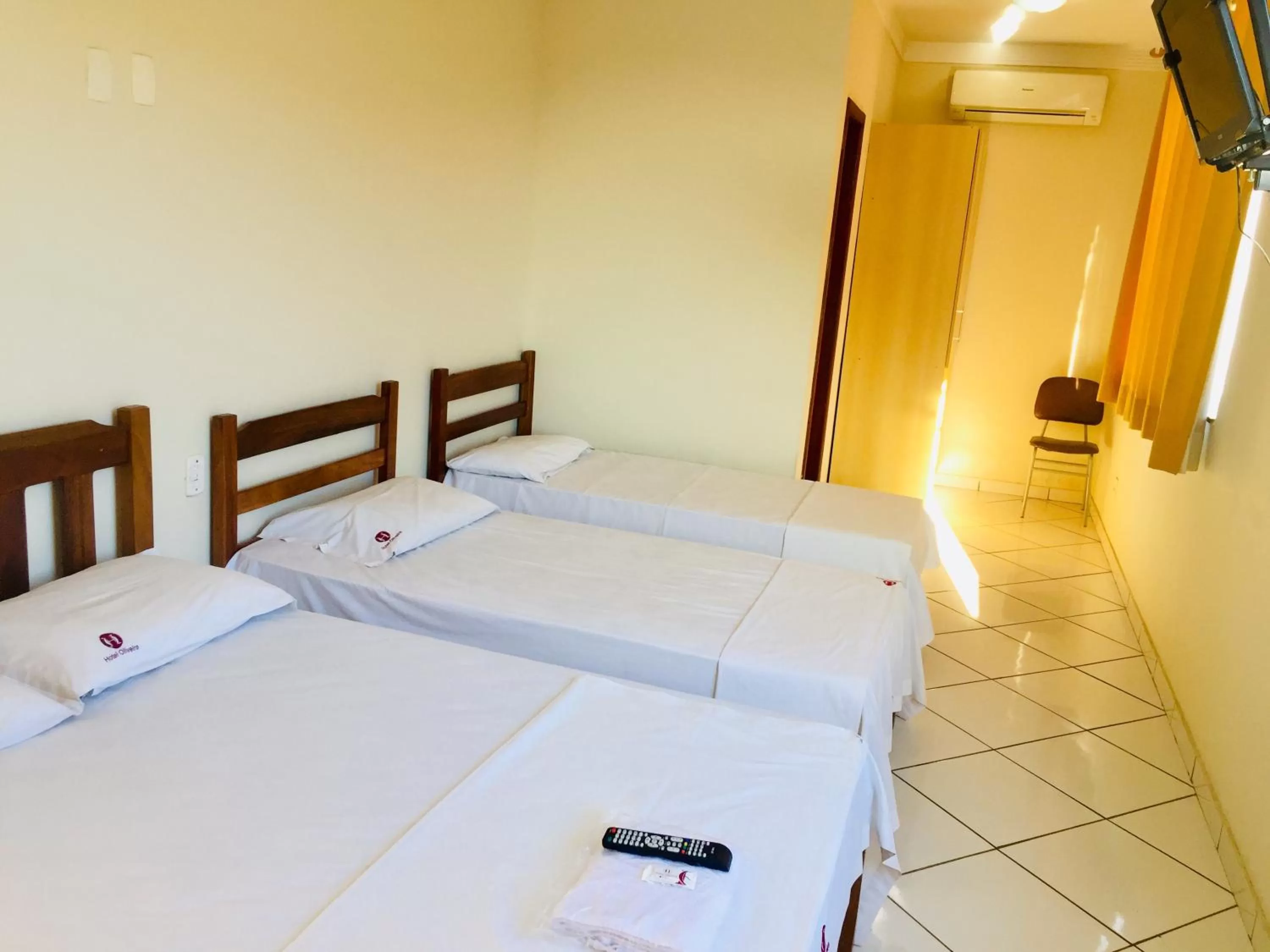 Bed in Hotel Oliveira