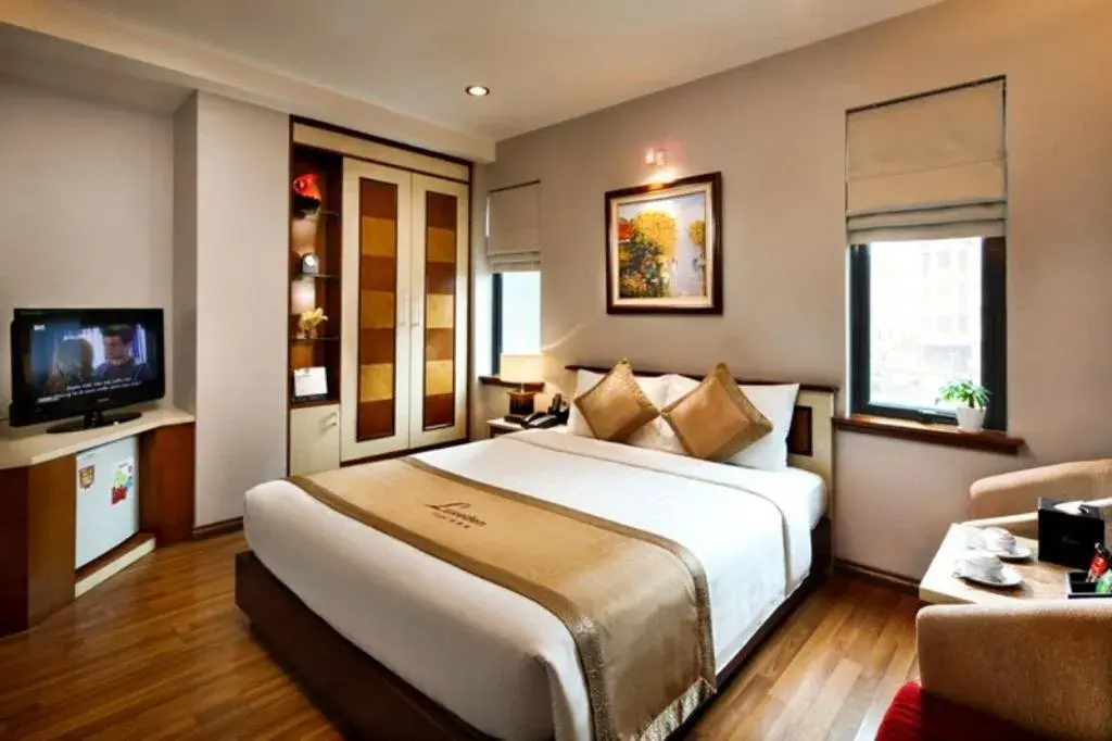 Bed in Luxeden Hotel