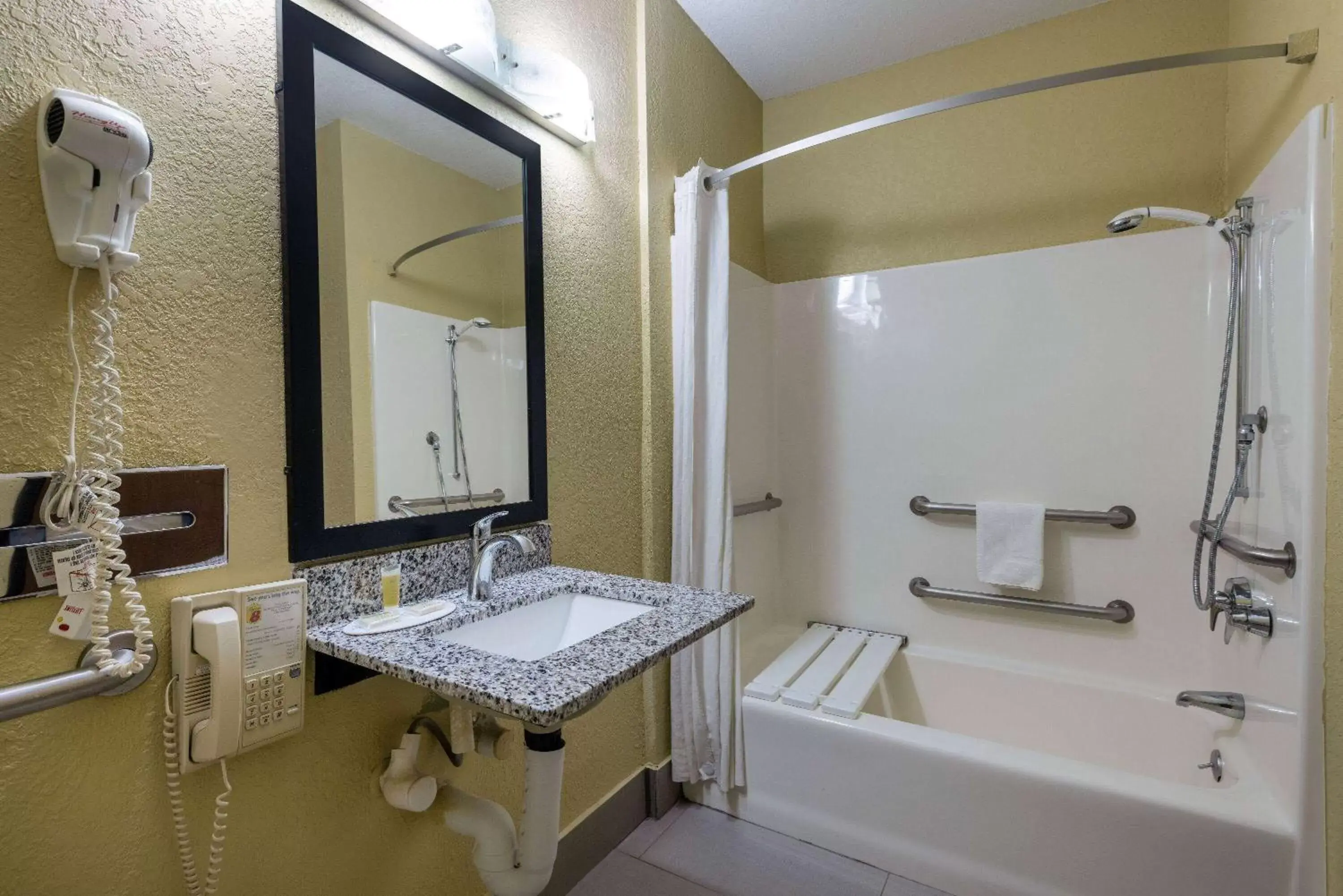 Bathroom in Super 8 by Wyndham Nixa/Springfield Area