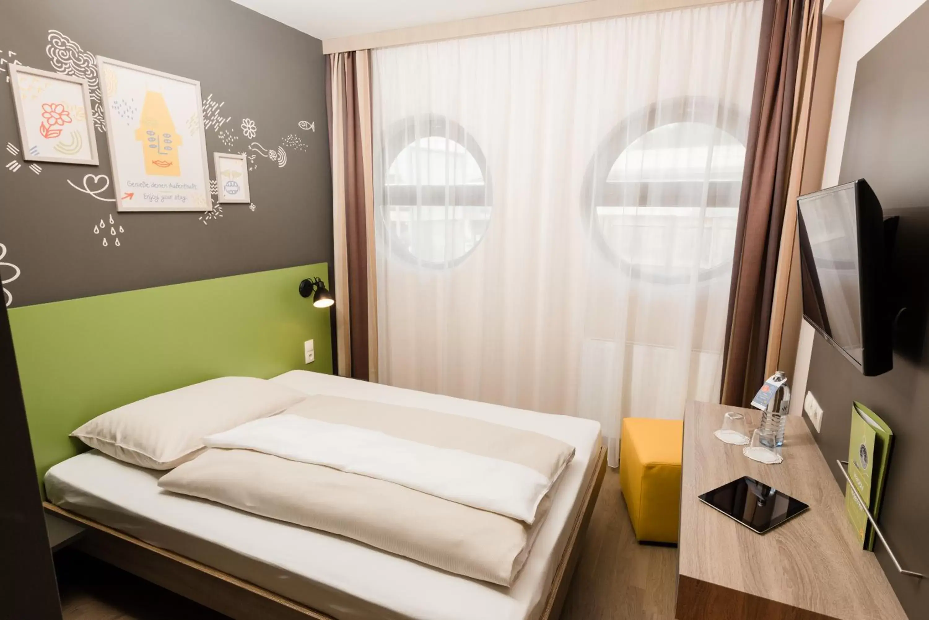 Photo of the whole room, Bed in JUFA Hotel Graz Süd
