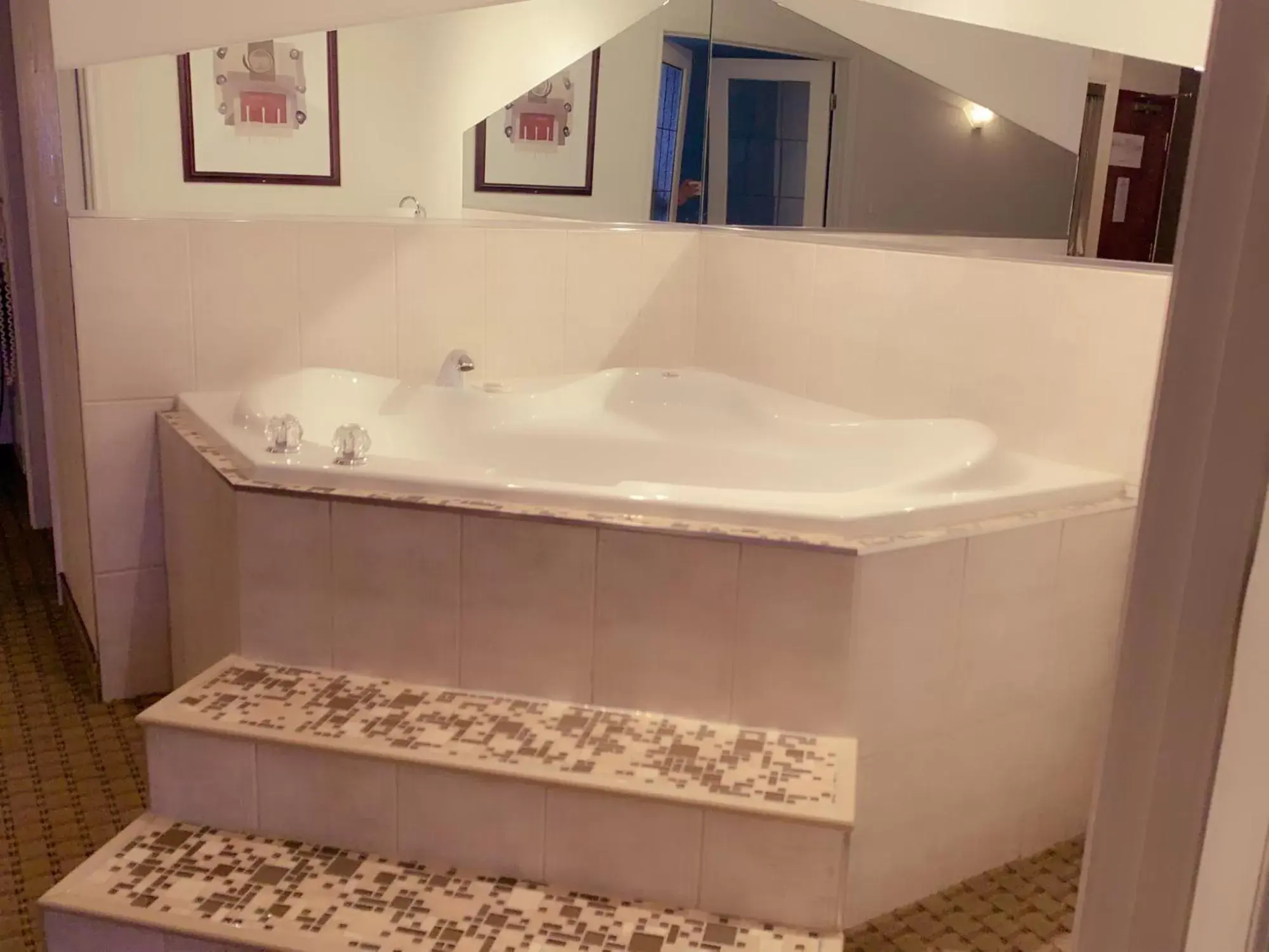 Bathroom in Ramada by Wyndham Red Deer Hotel & Suites