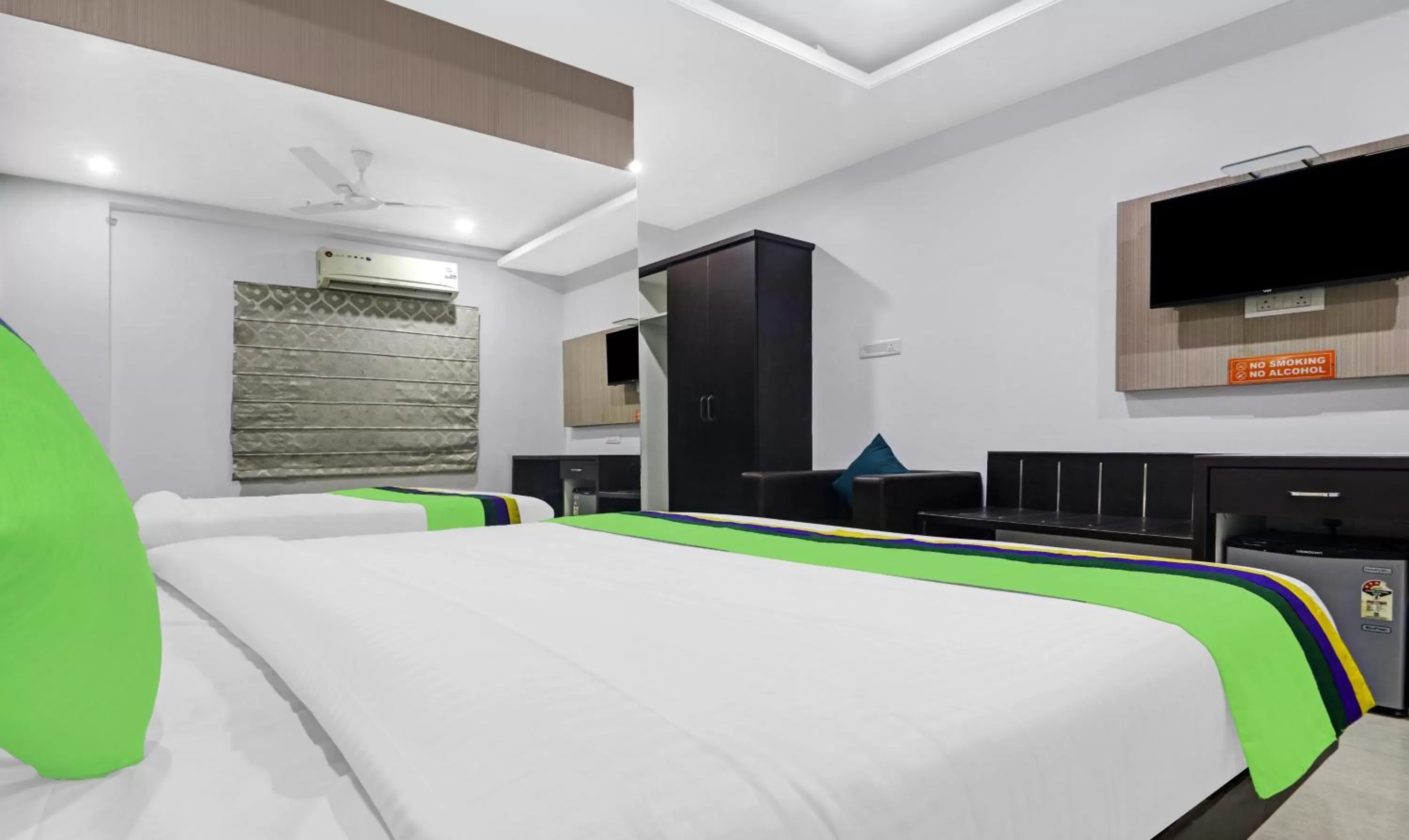 Bed in Treebo Kruthika Residency