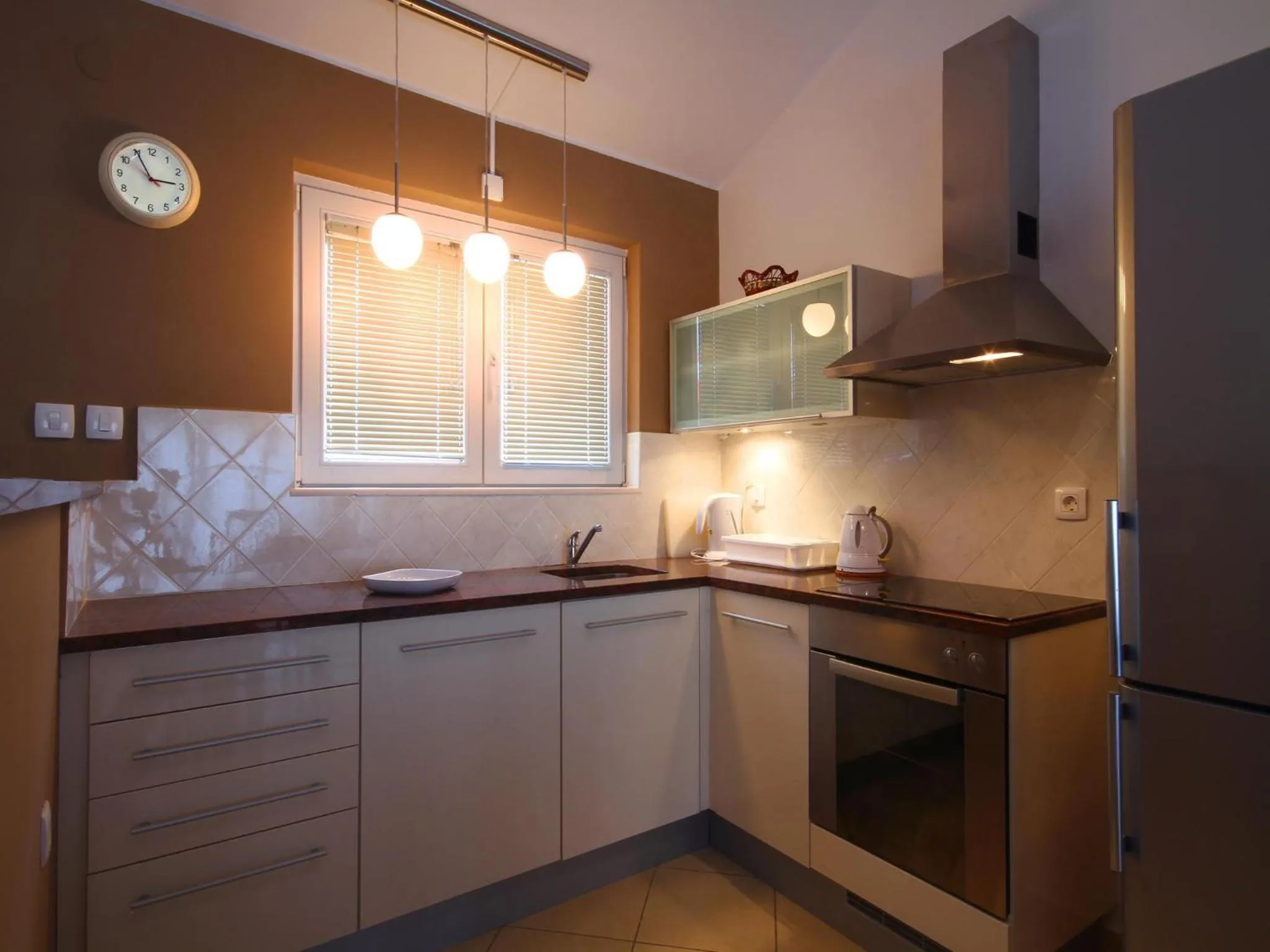 Kitchen or kitchenette in Spa Resort Bečići