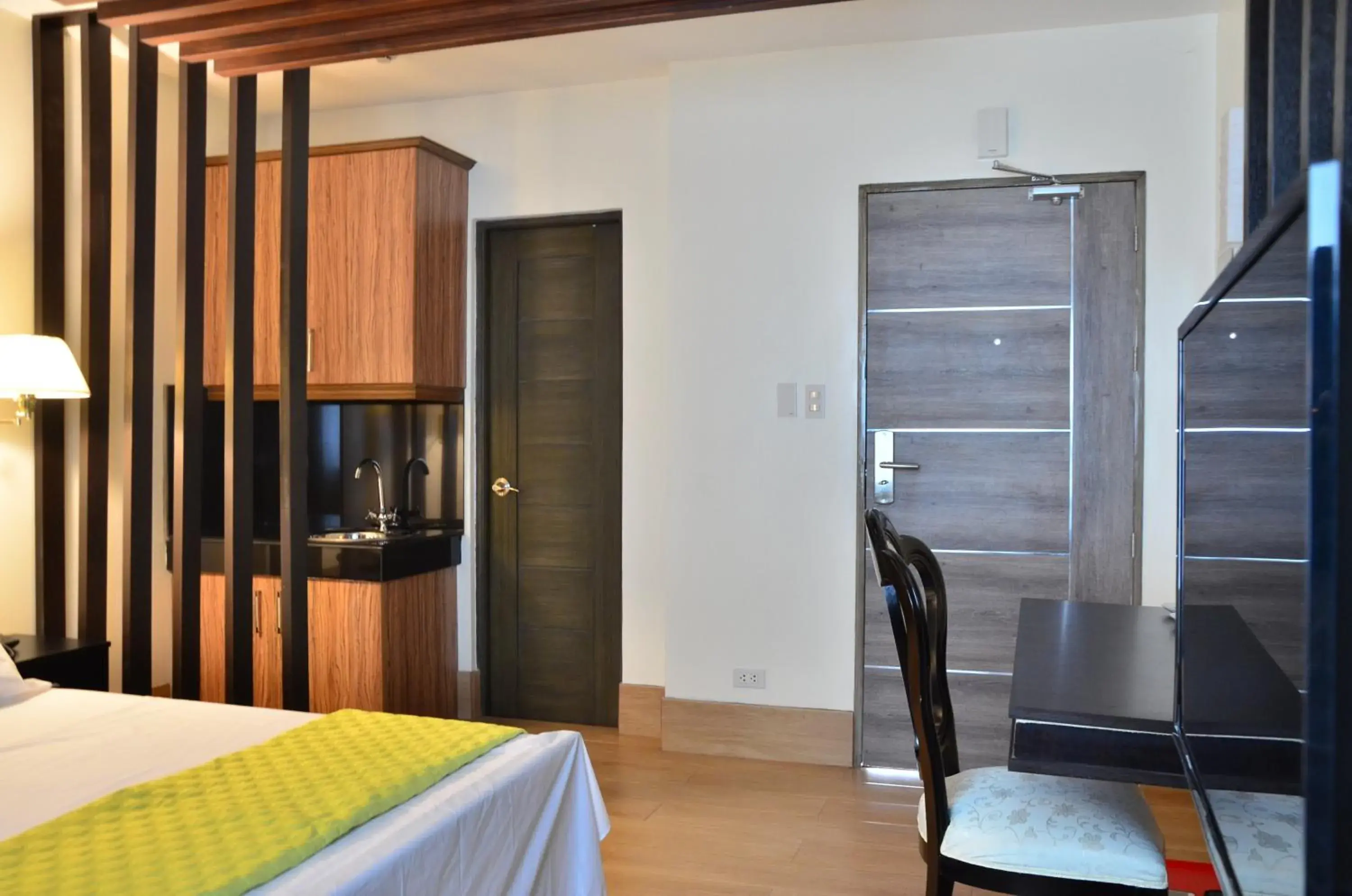 Bed, TV/Entertainment Center in Oriental Zen Suites