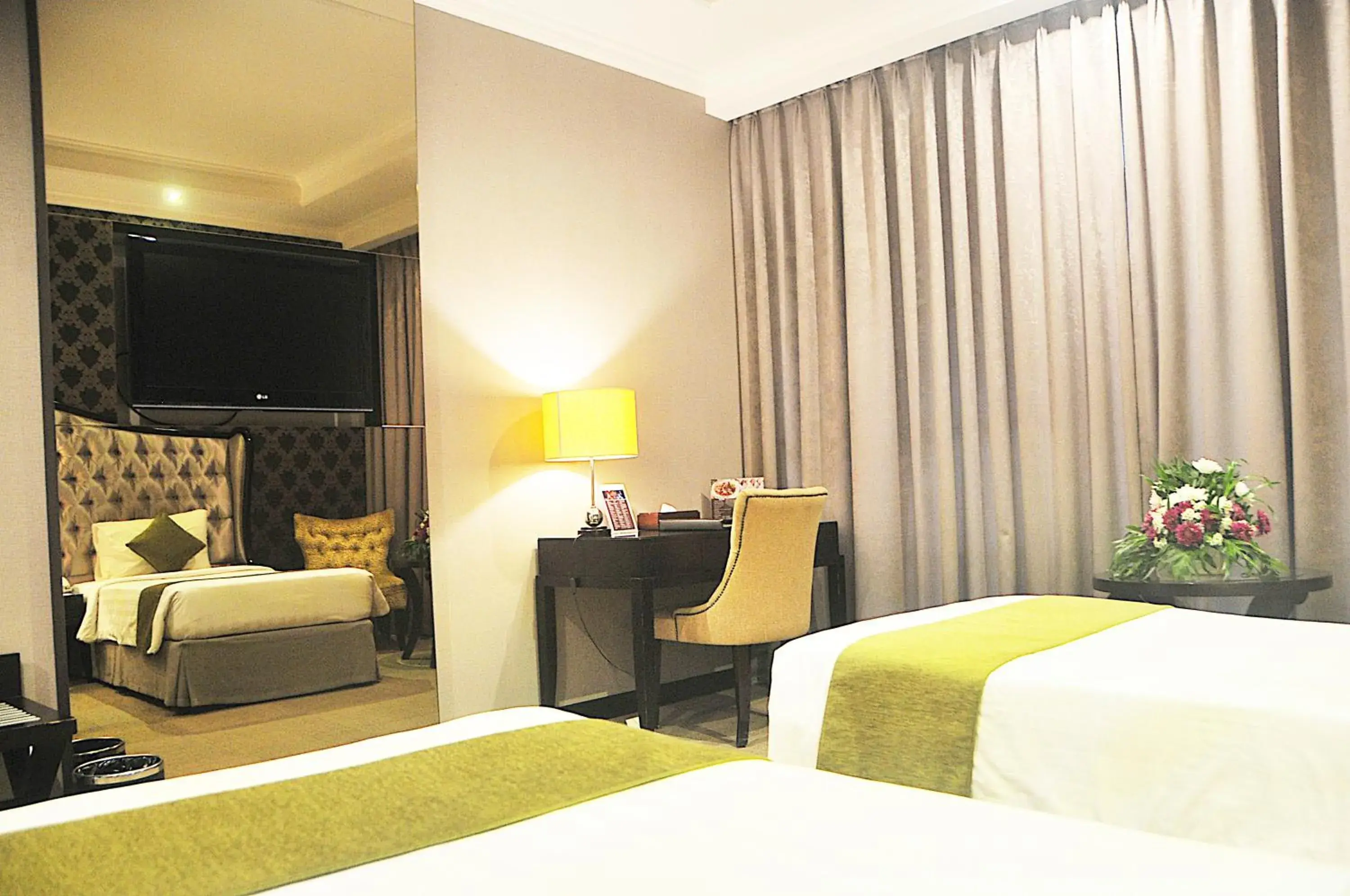 Photo of the whole room, Bed in The Mirah Bogor Hotel