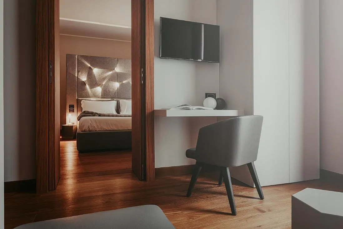 Seating area, Bed in Bacã Suites, Restaurant & Bar