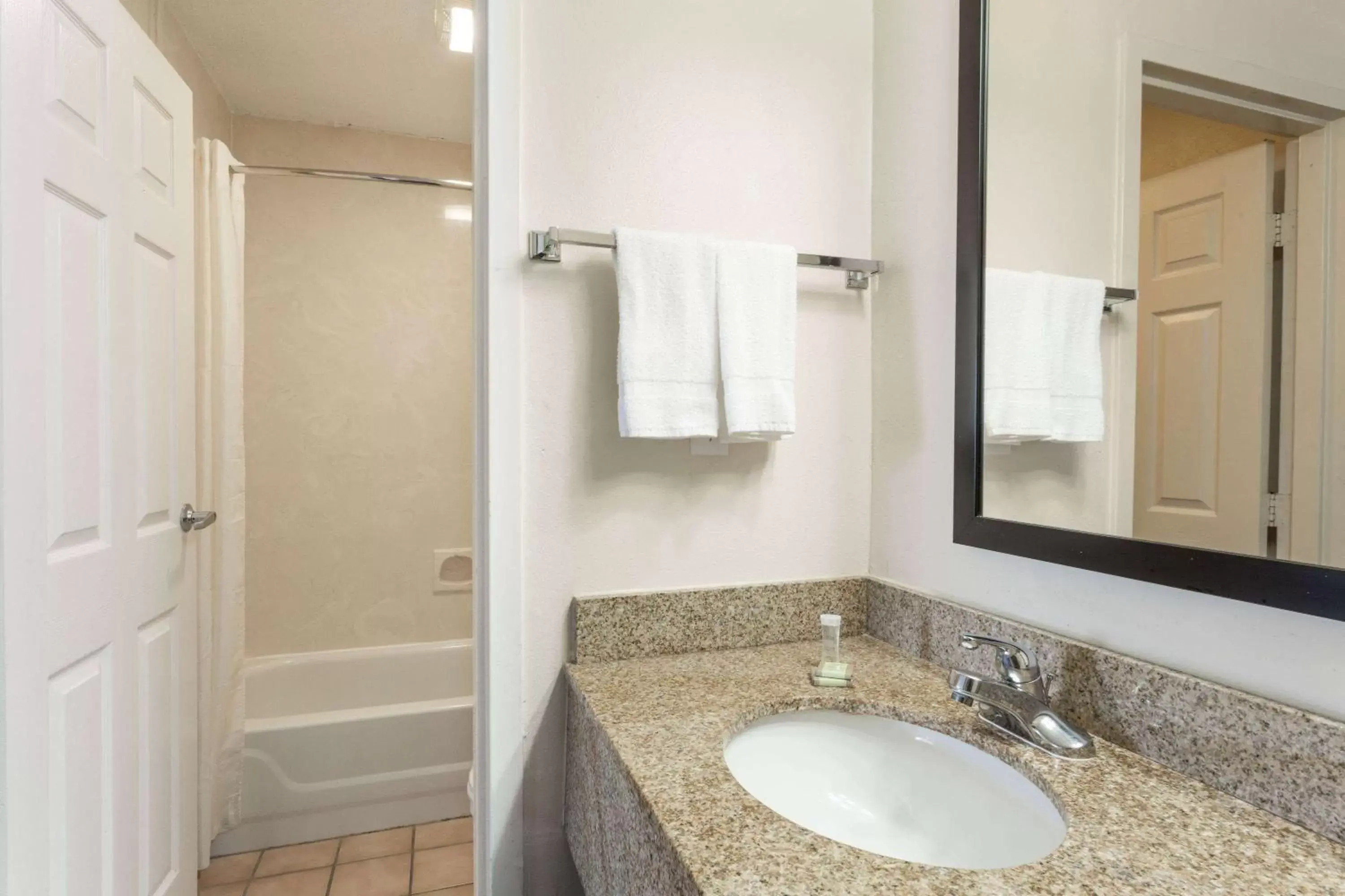 Photo of the whole room, Bathroom in Super 8 by Wyndham Slidell