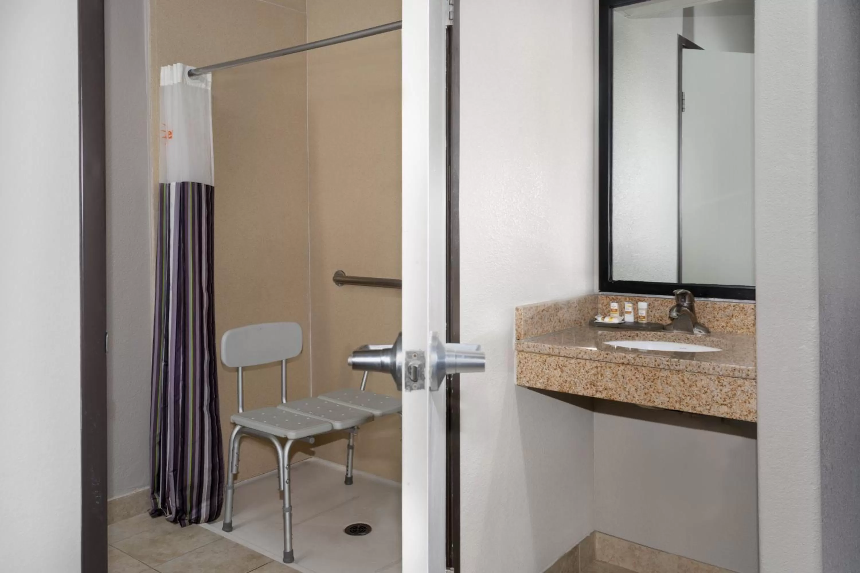 Bathroom in Baymont by Wyndham Henderson-Northeast Denver