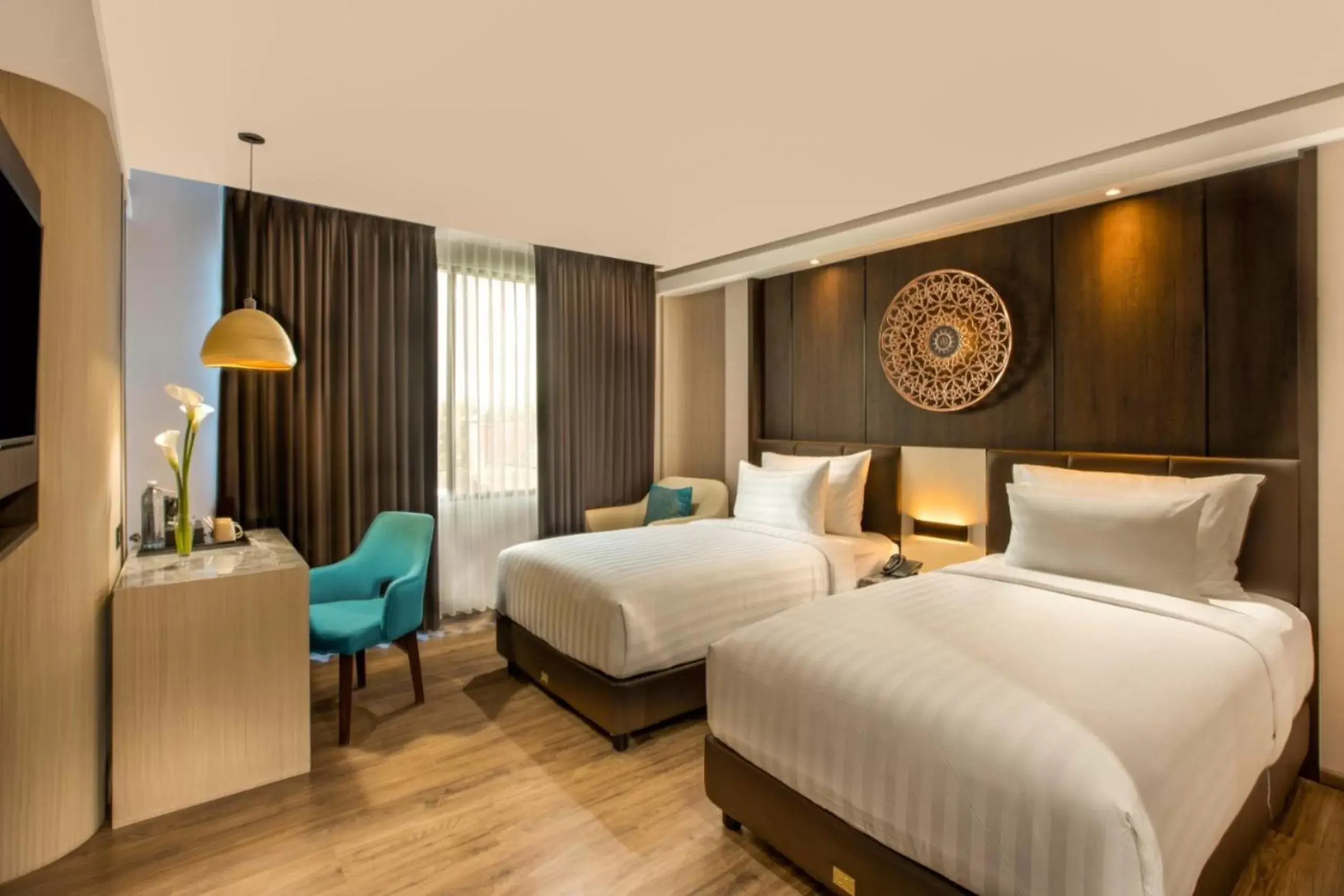 Bed in The Manohara Hotel Yogyakarta