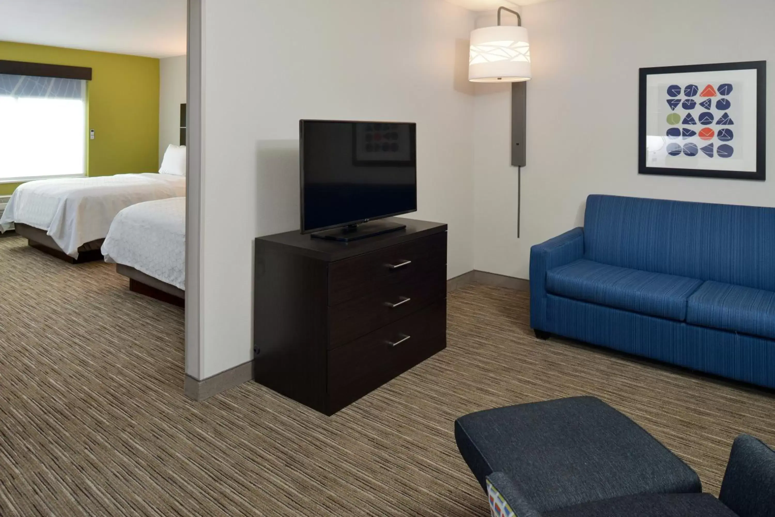 Photo of the whole room, TV/Entertainment Center in Holiday Inn Express & Suites Pueblo, an IHG Hotel