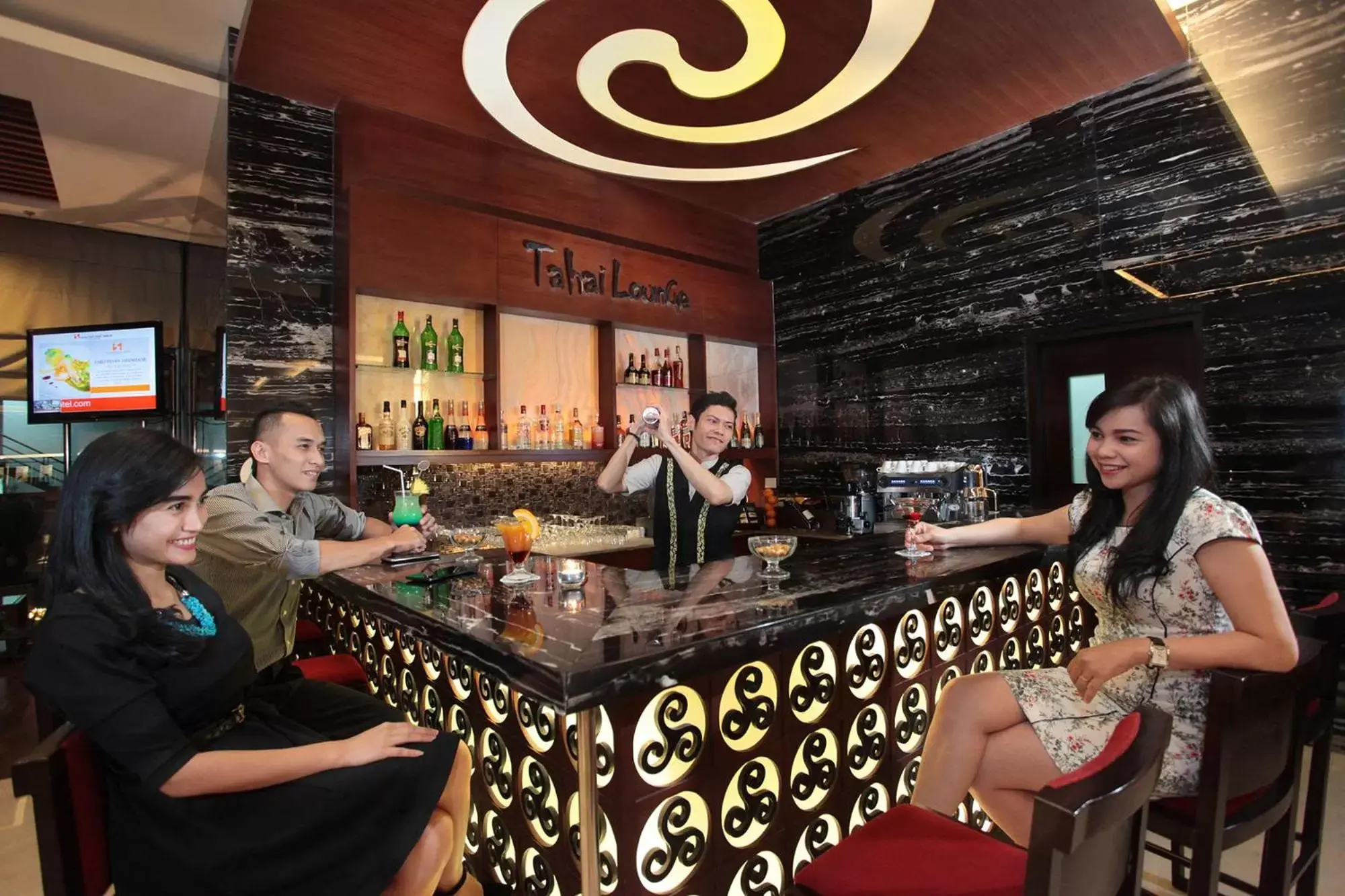 Lounge or bar in Swiss-Belhotel Danum Palangkaraya