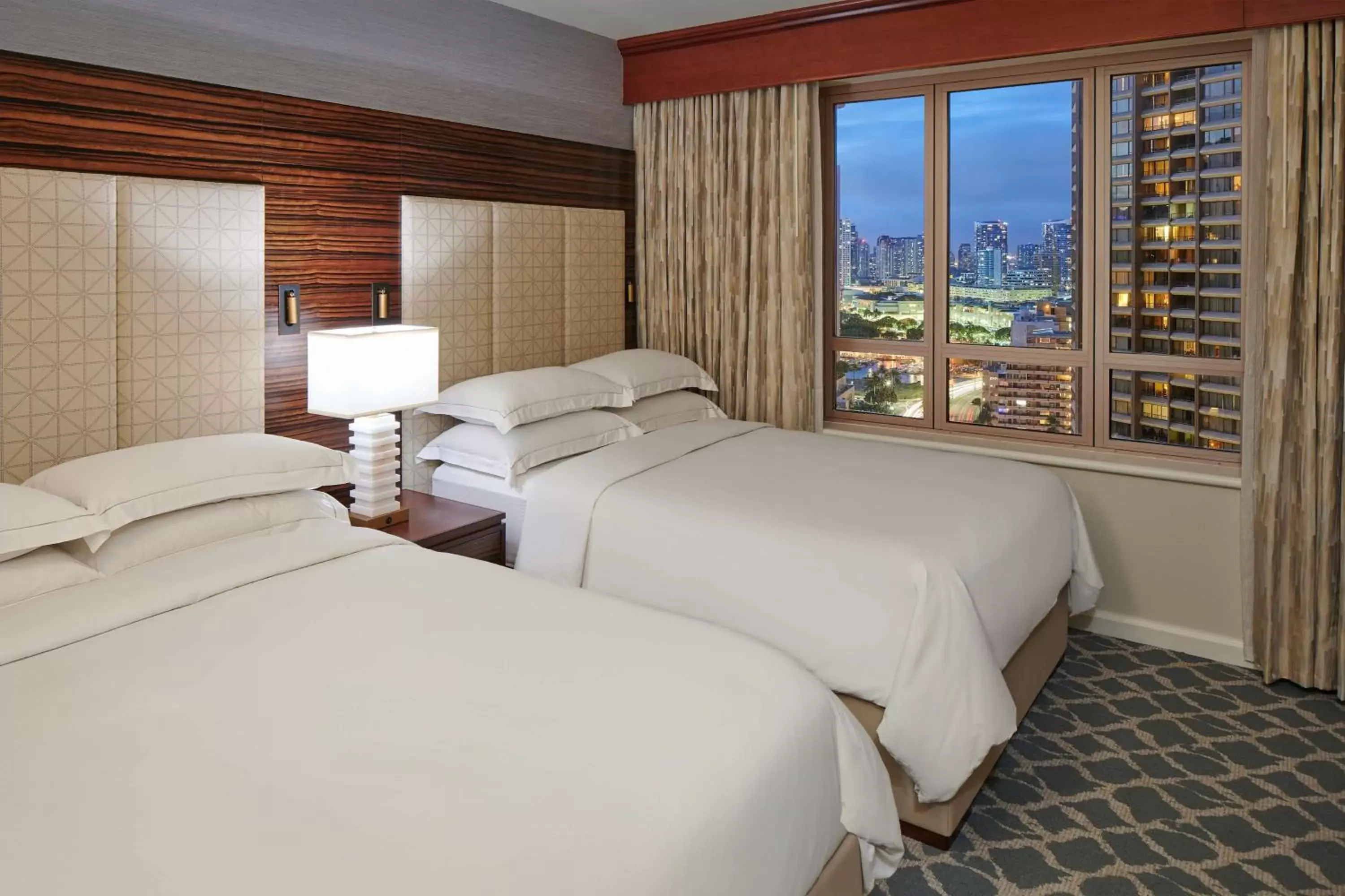 Bed in Hilton Grand Vacations Club Grand Waikikian Honolulu