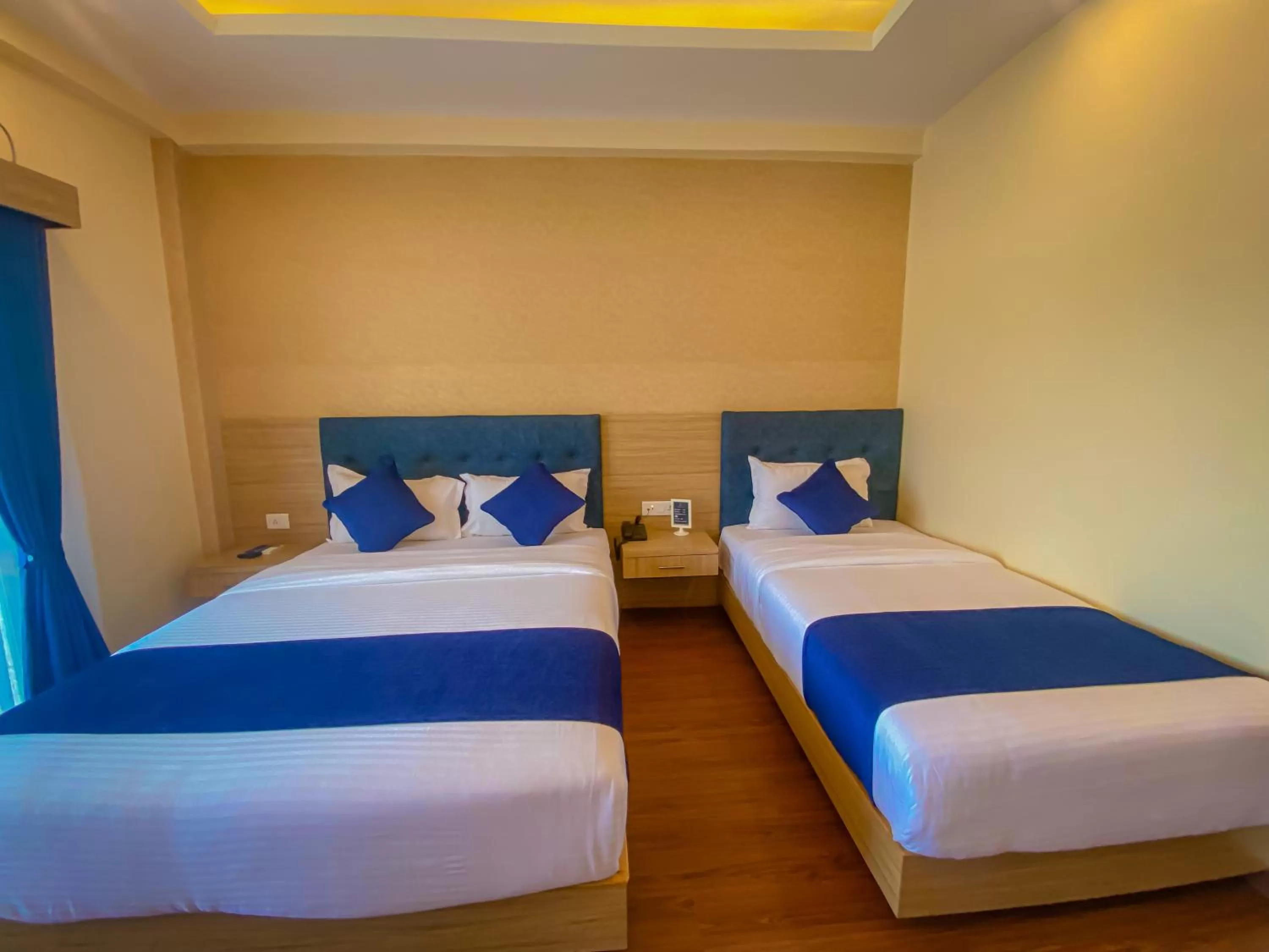 Bed in Majestic Lake Front Hotel & Suites