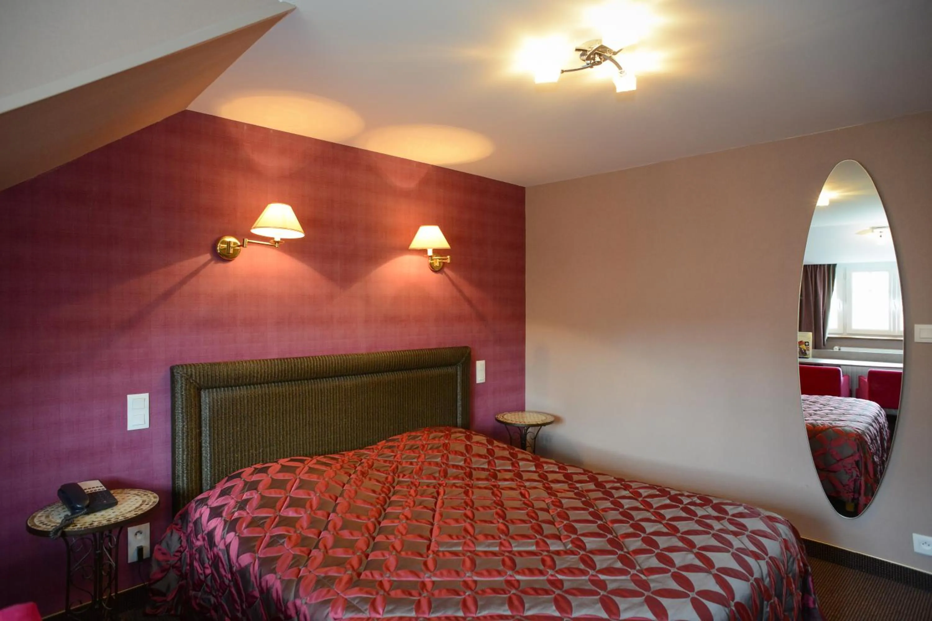 Photo of the whole room, Bed in Hôtel de La Croix d'Or