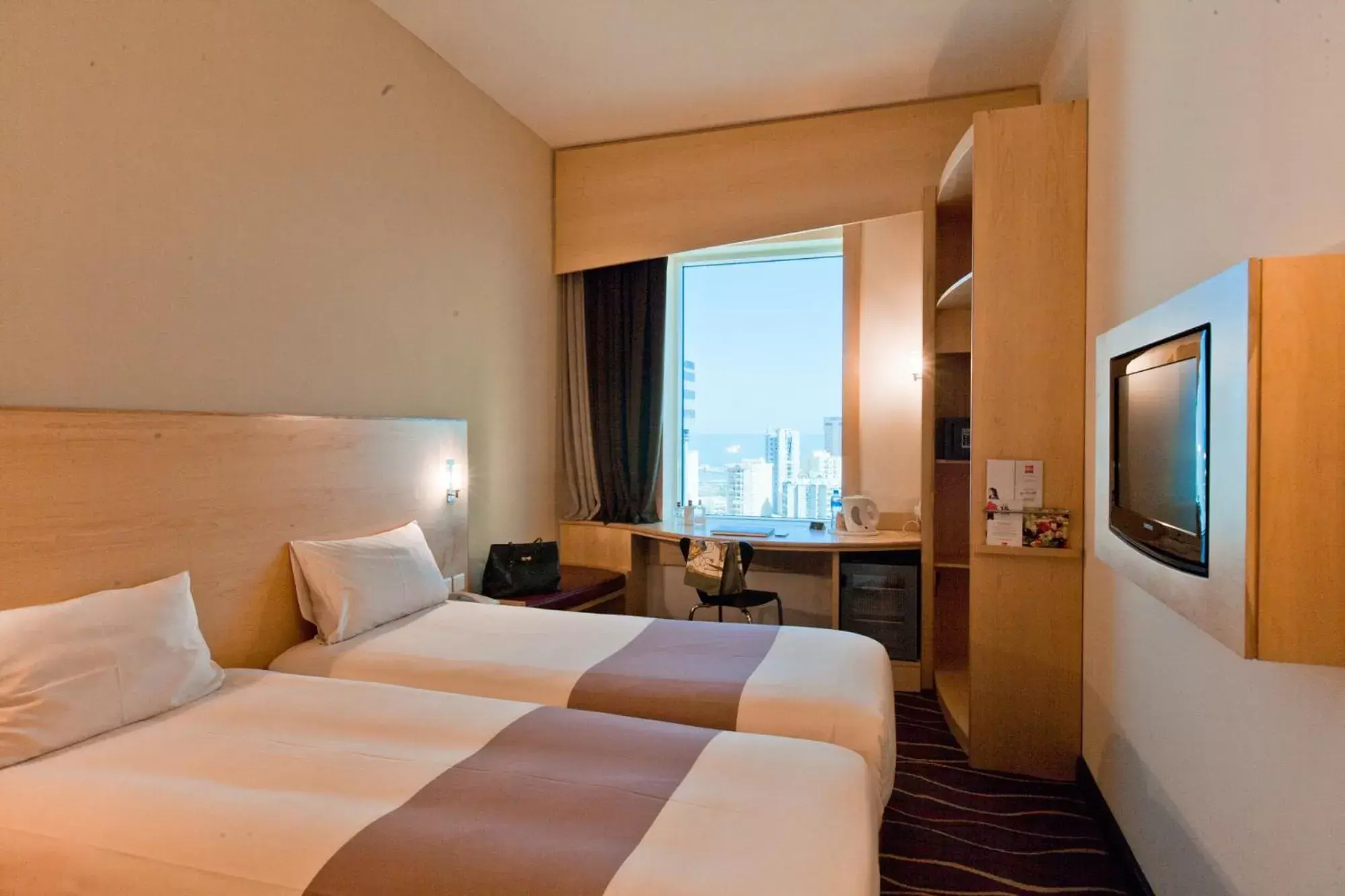 Bed in ibis Sharq