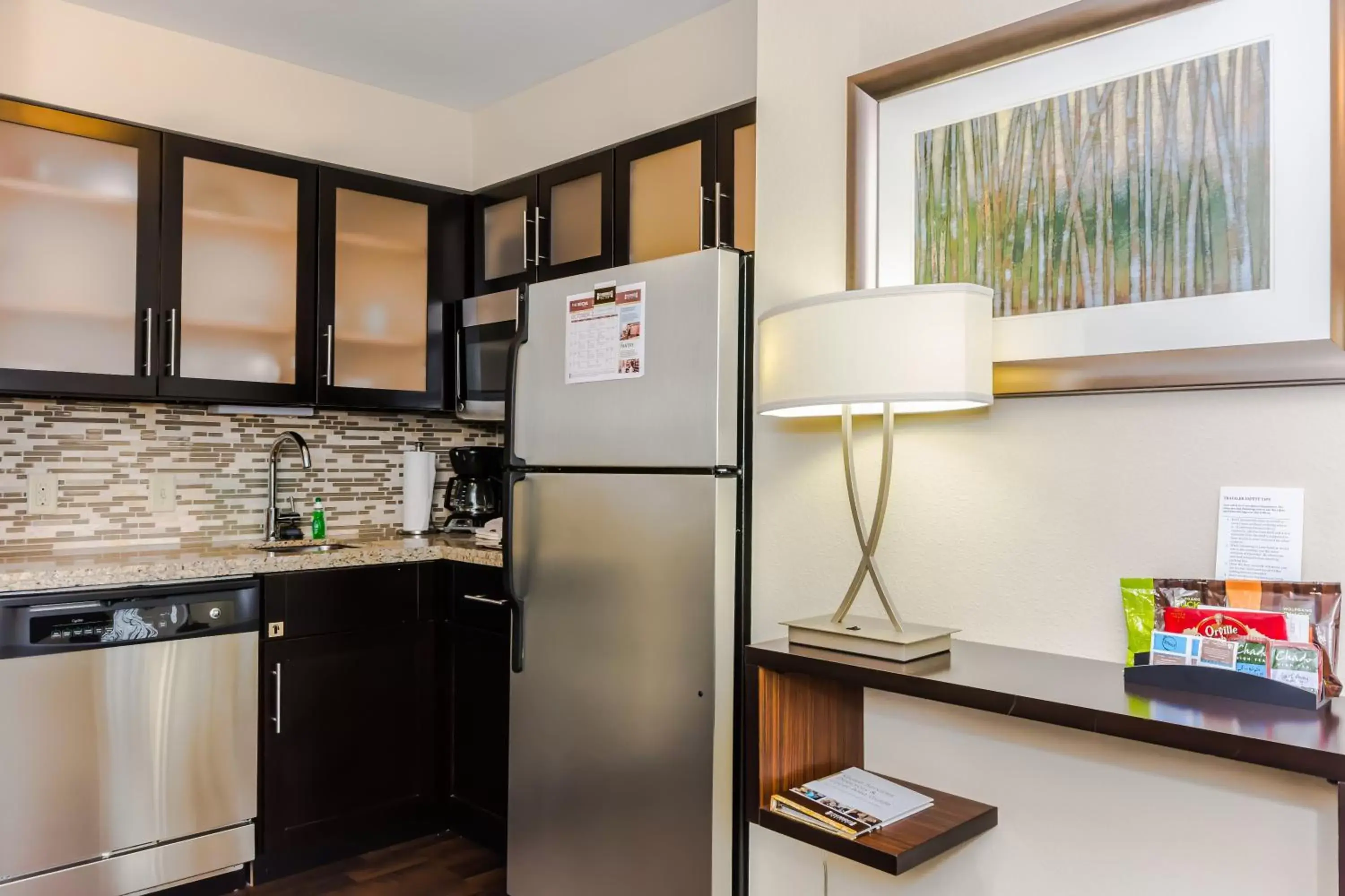 Photo of the whole room, Kitchen/Kitchenette in Staybridge Suites Grand Forks, an IHG Hotel