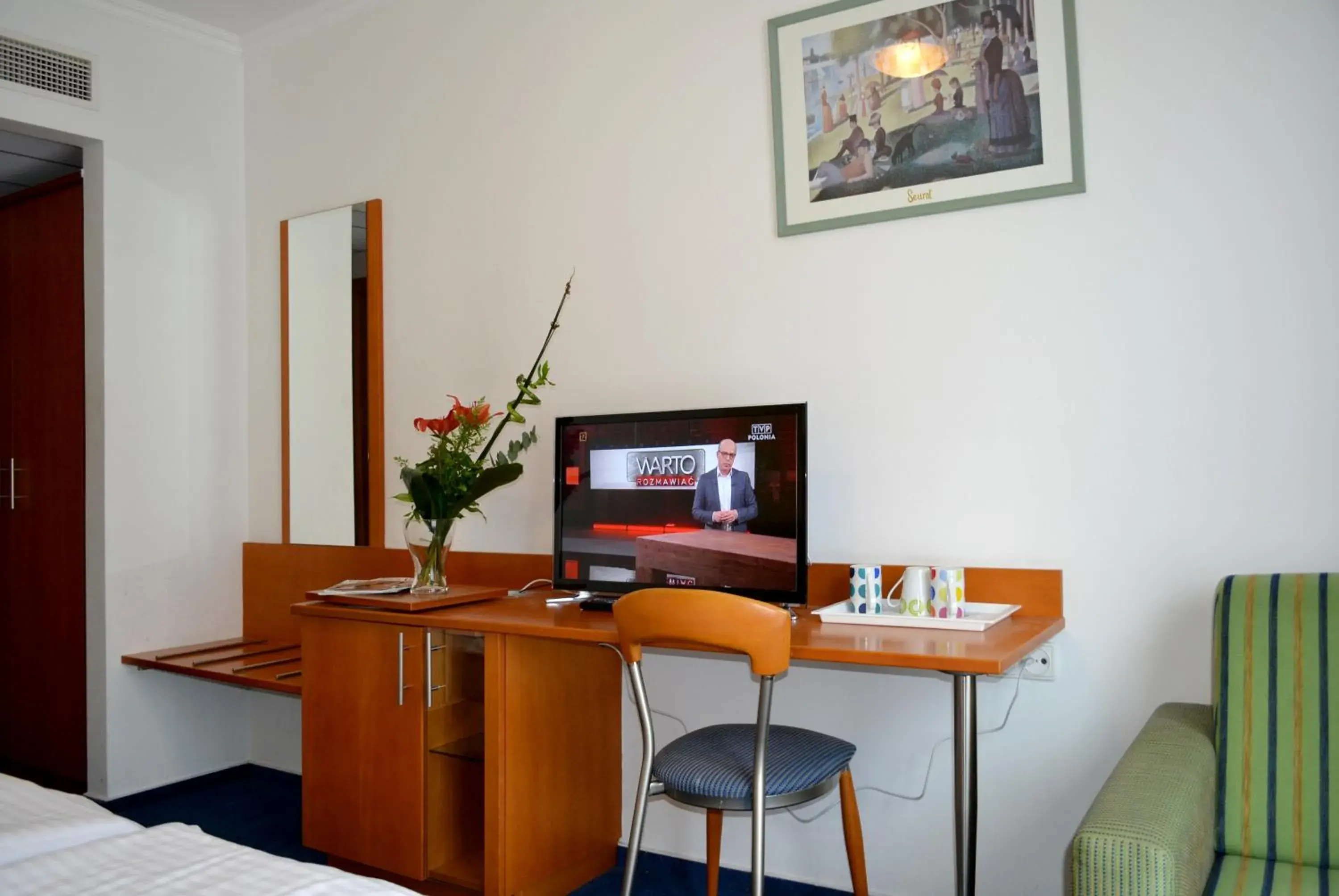 Bed, TV/Entertainment Center in Hotel Veritas