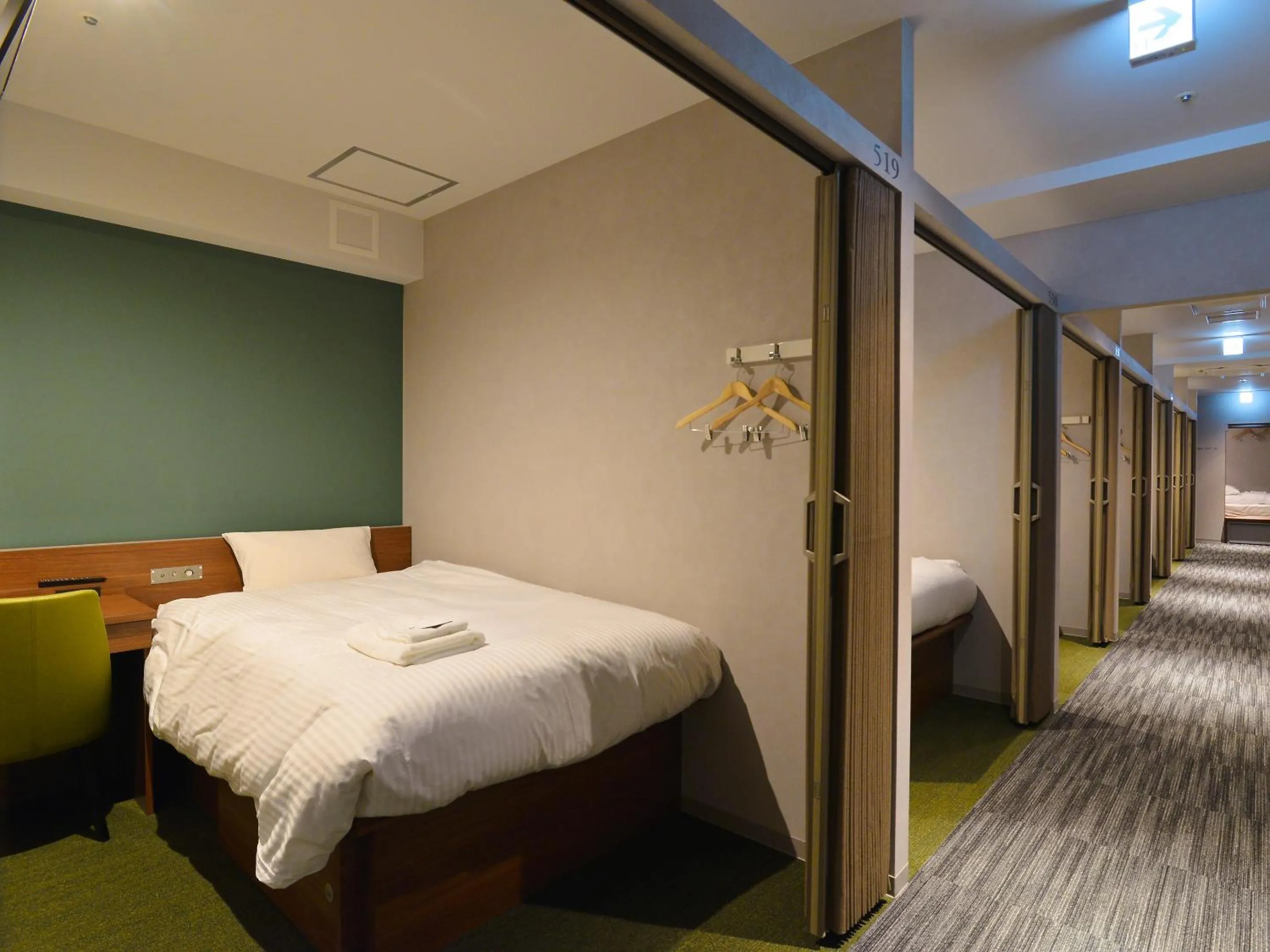 Bed in Gardens Cabin