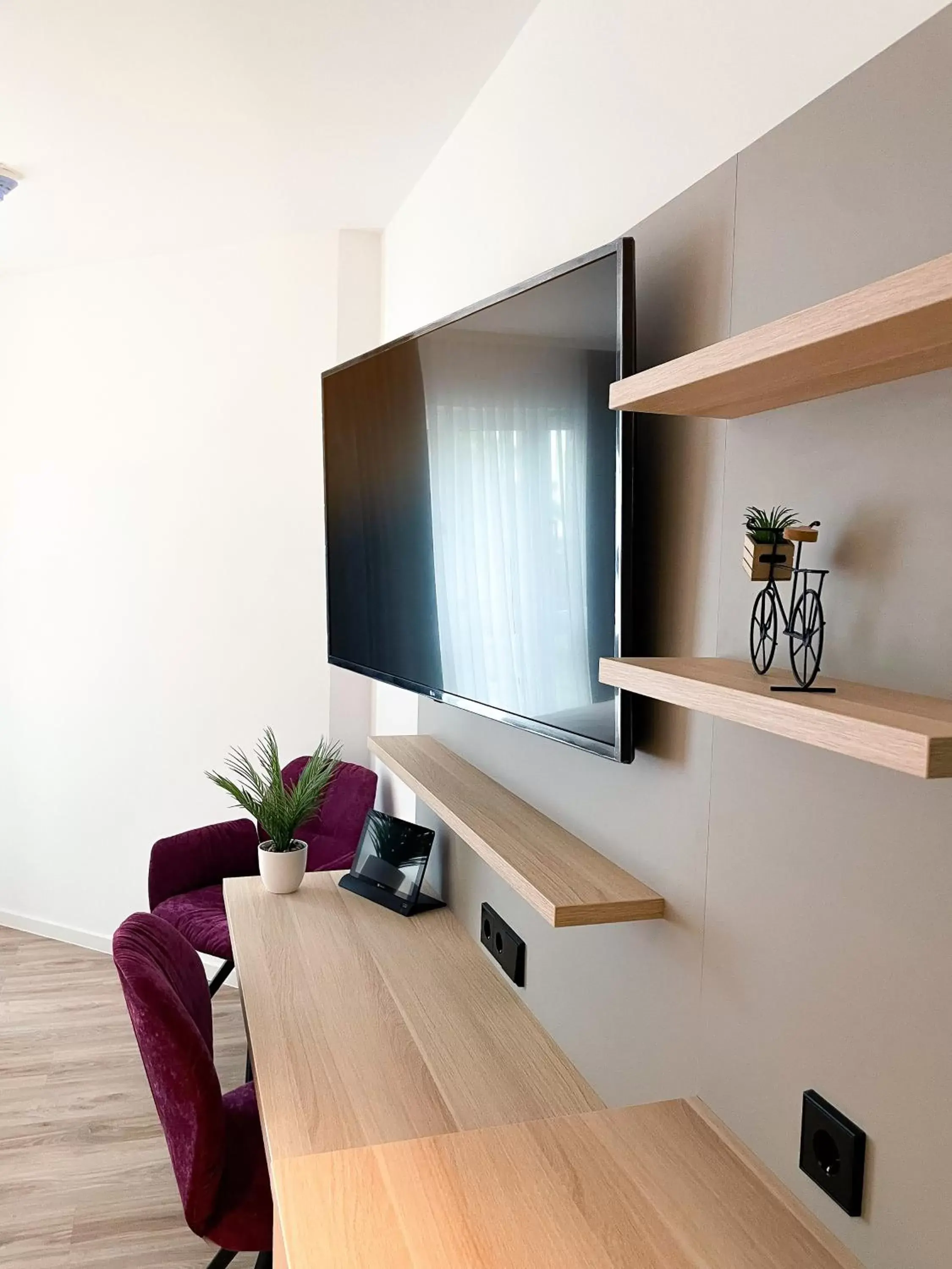 TV/Entertainment Center in HOLI-Berlin Hotel