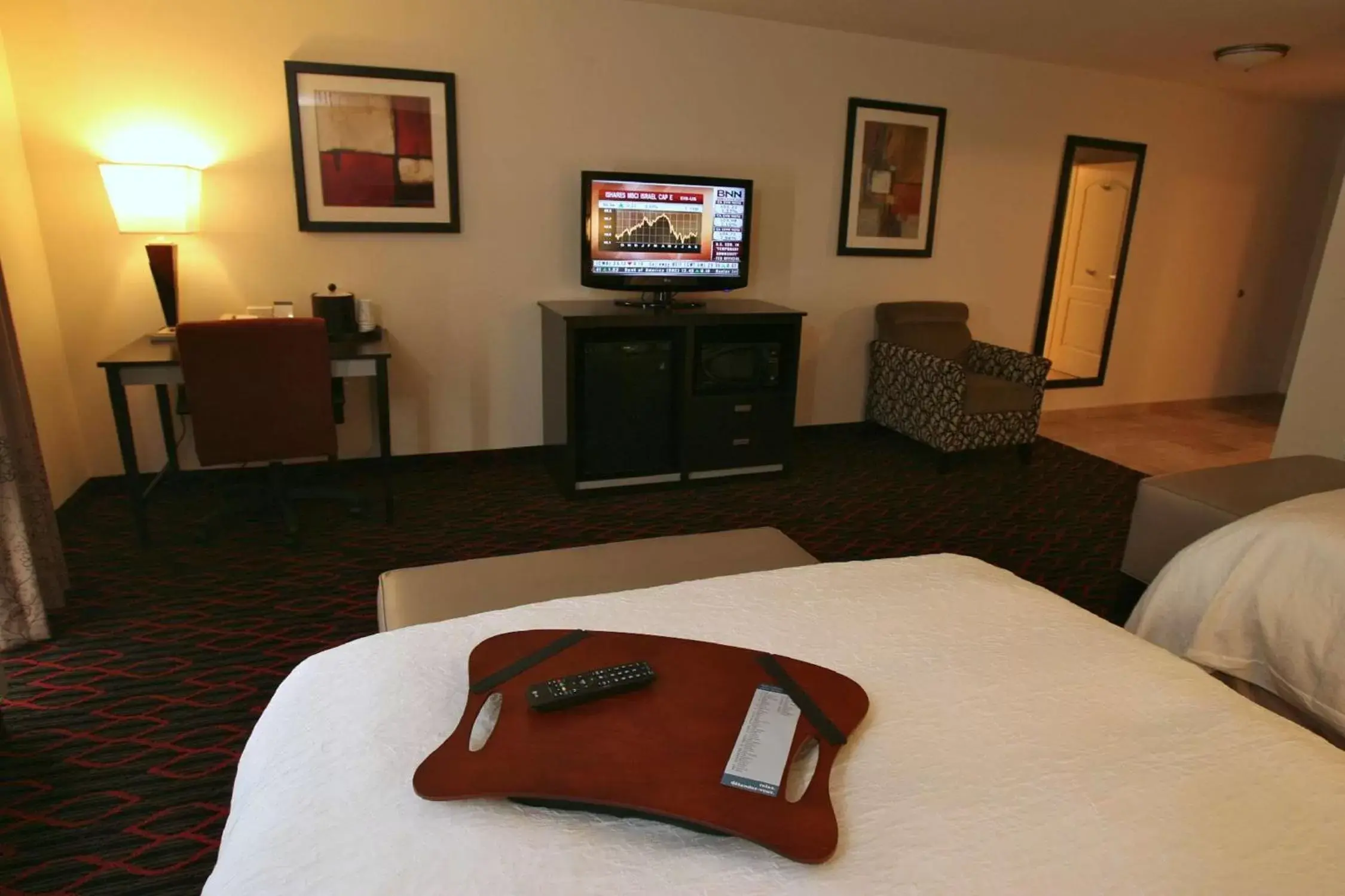 Bed, TV/Entertainment Center in Hampton Inn & Suites Red Deer