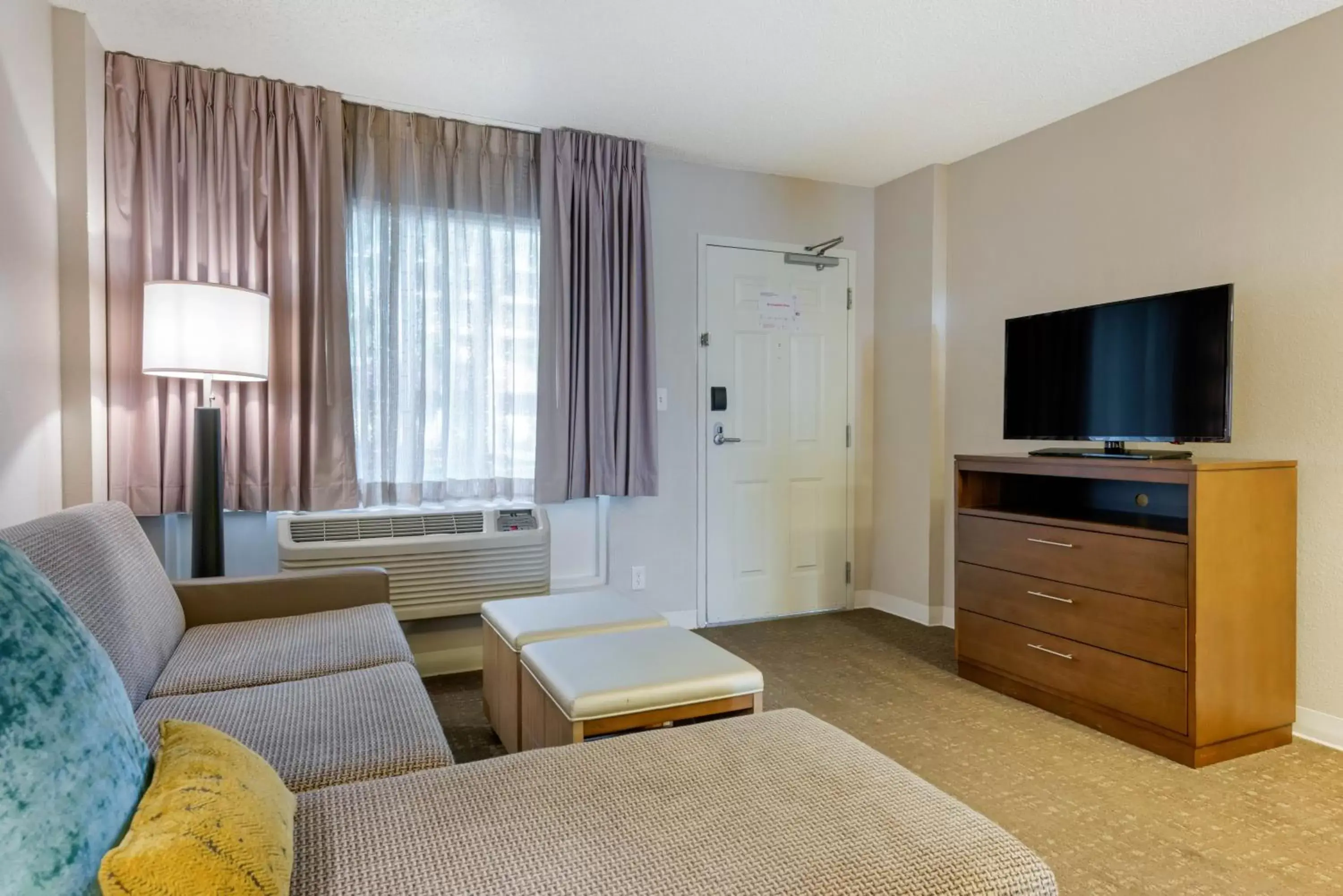 Photo of the whole room, TV/Entertainment Center in Staybridge Suites Orlando Royale Parc Suites, an IHG Hotel