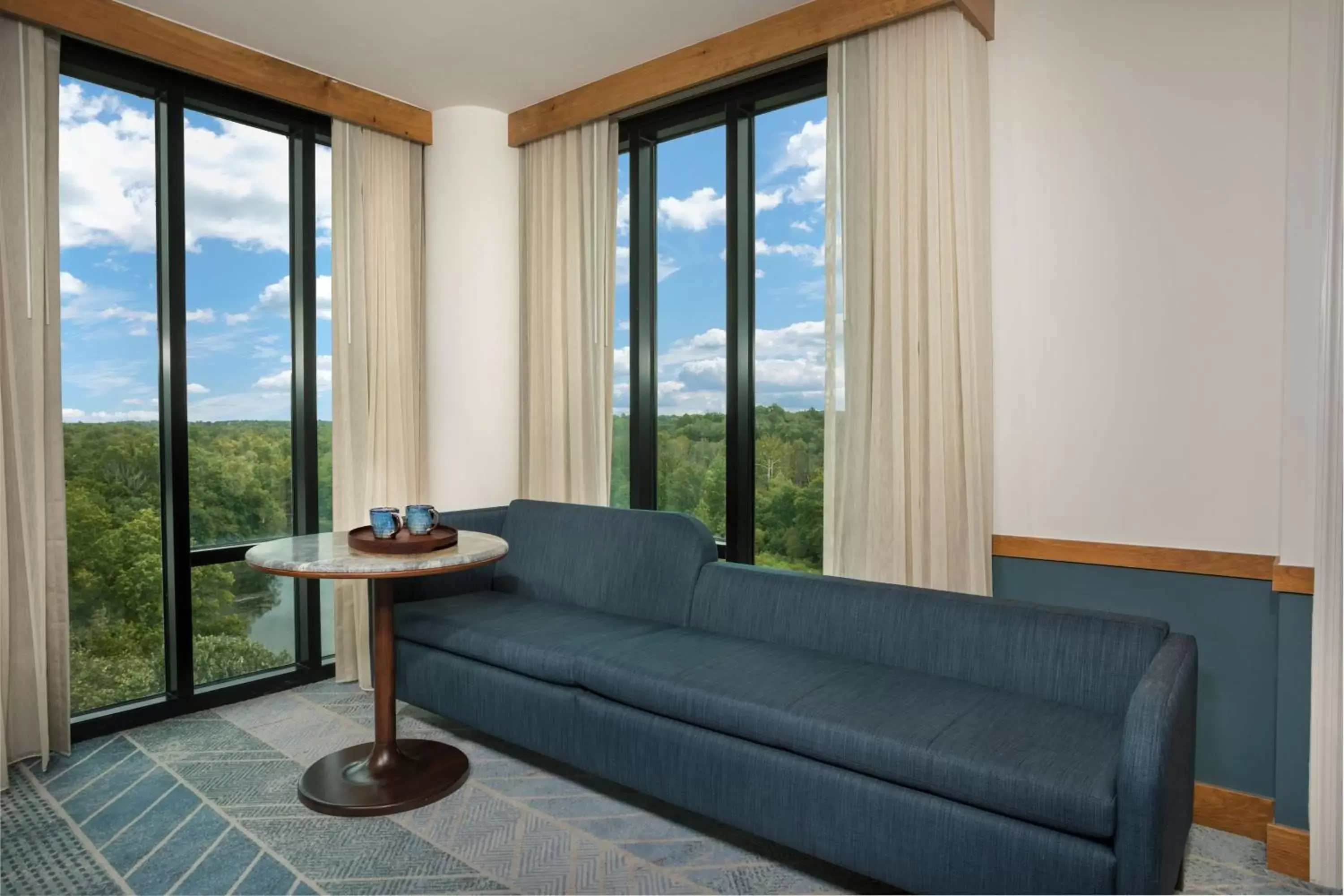 Bedroom, Seating Area in Merriweather Lakehouse Hotel, Autograph Collection