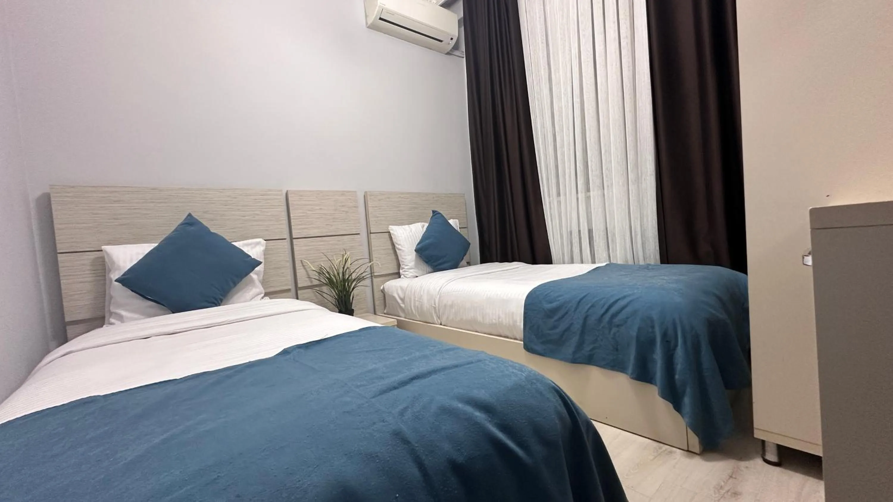 Bed in Overland Residence