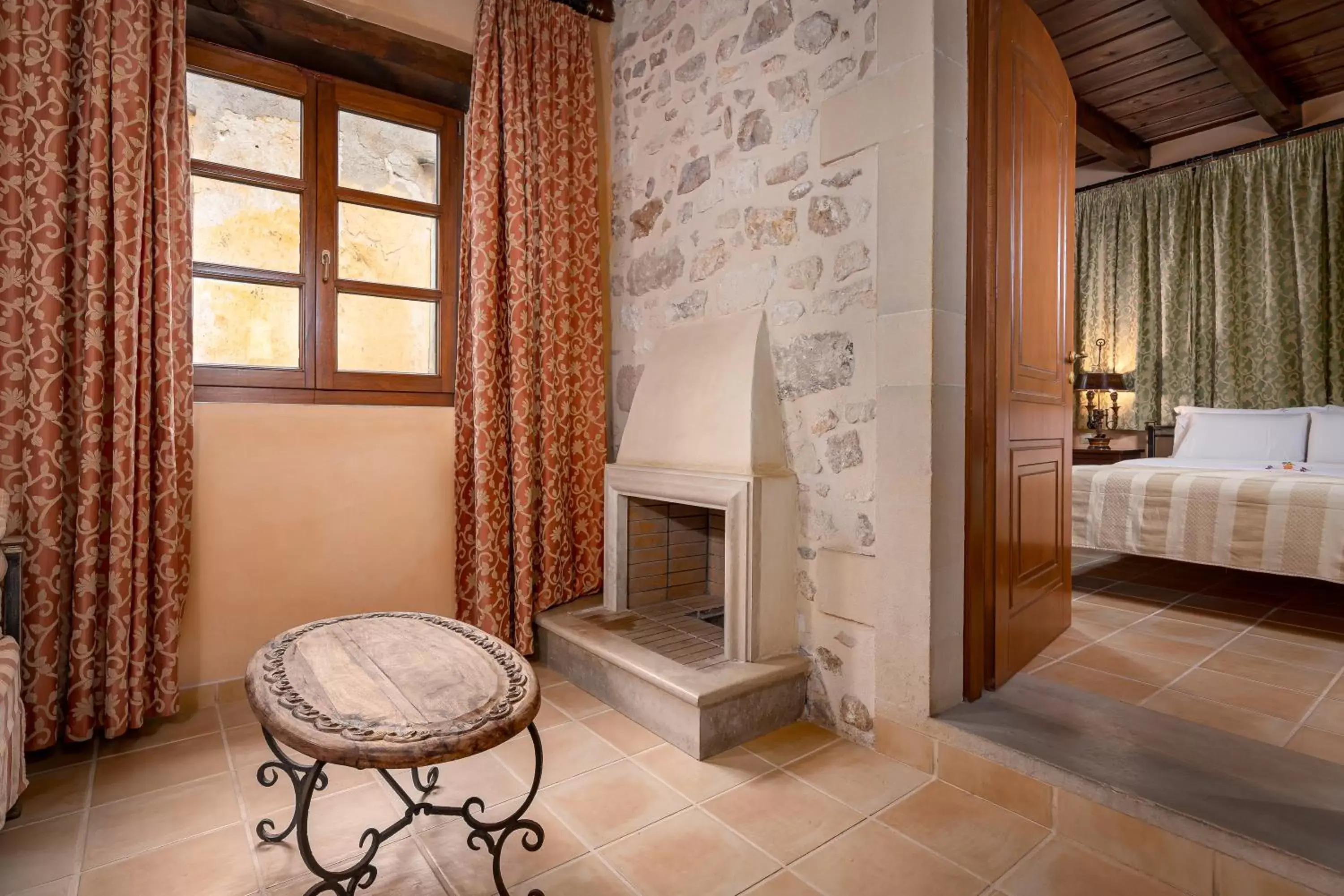 Seating area, Bed in Palazzino Di Corina