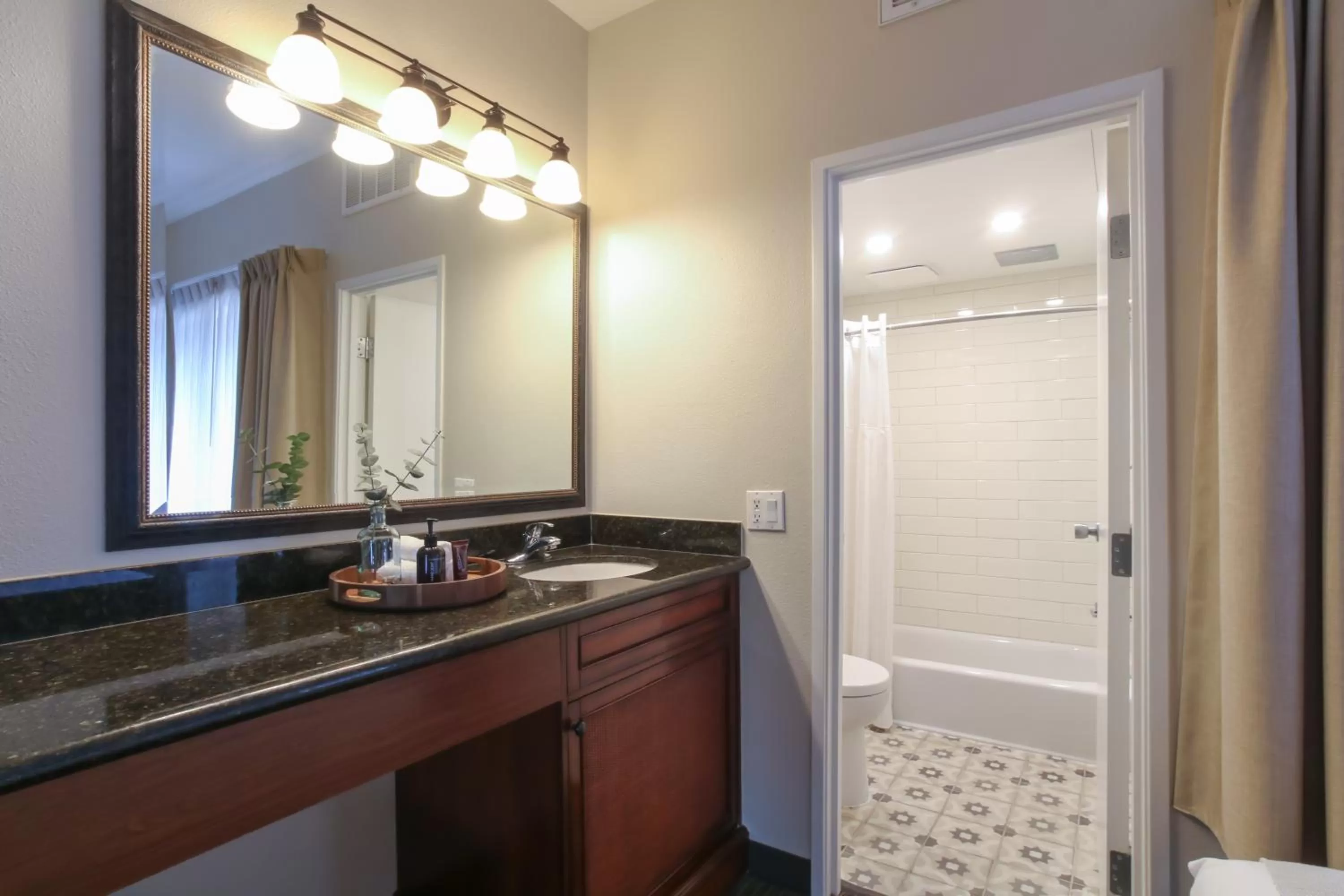 Bathroom in Oxford Suites Pismo Beach