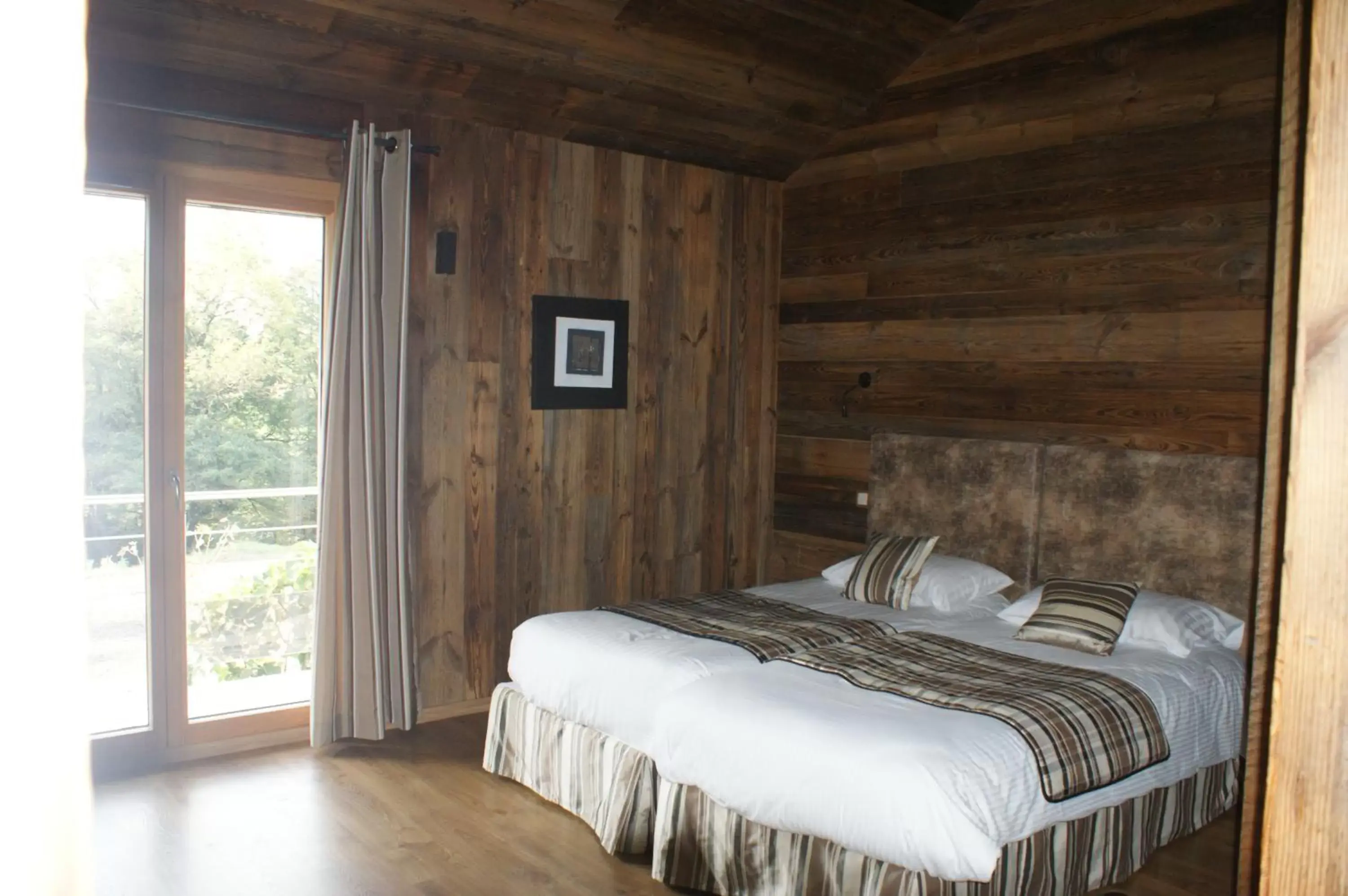 Garden view, Bed in Hotel Blanc