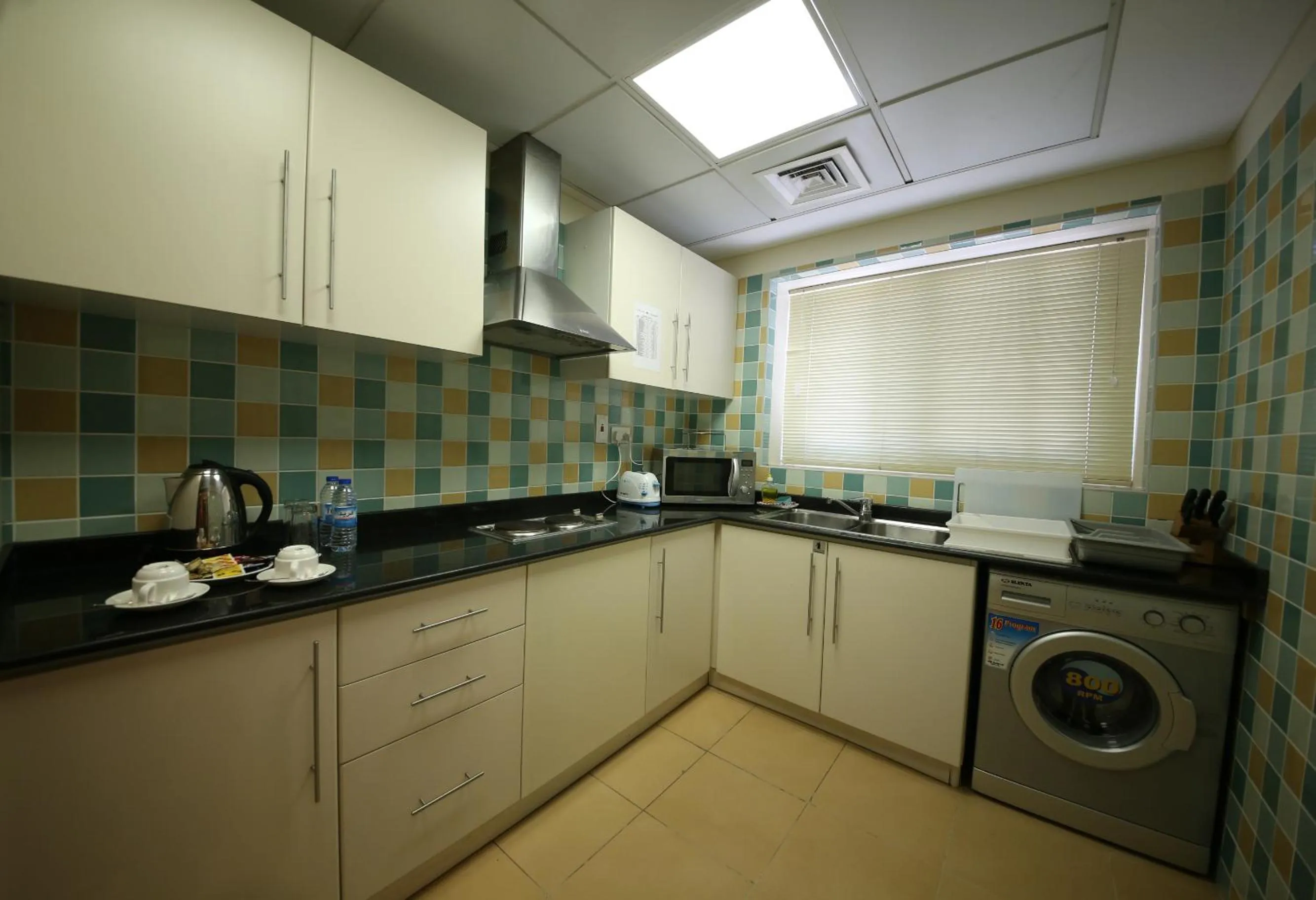 Kitchen or kitchenette in Tulip Hotel Apartments