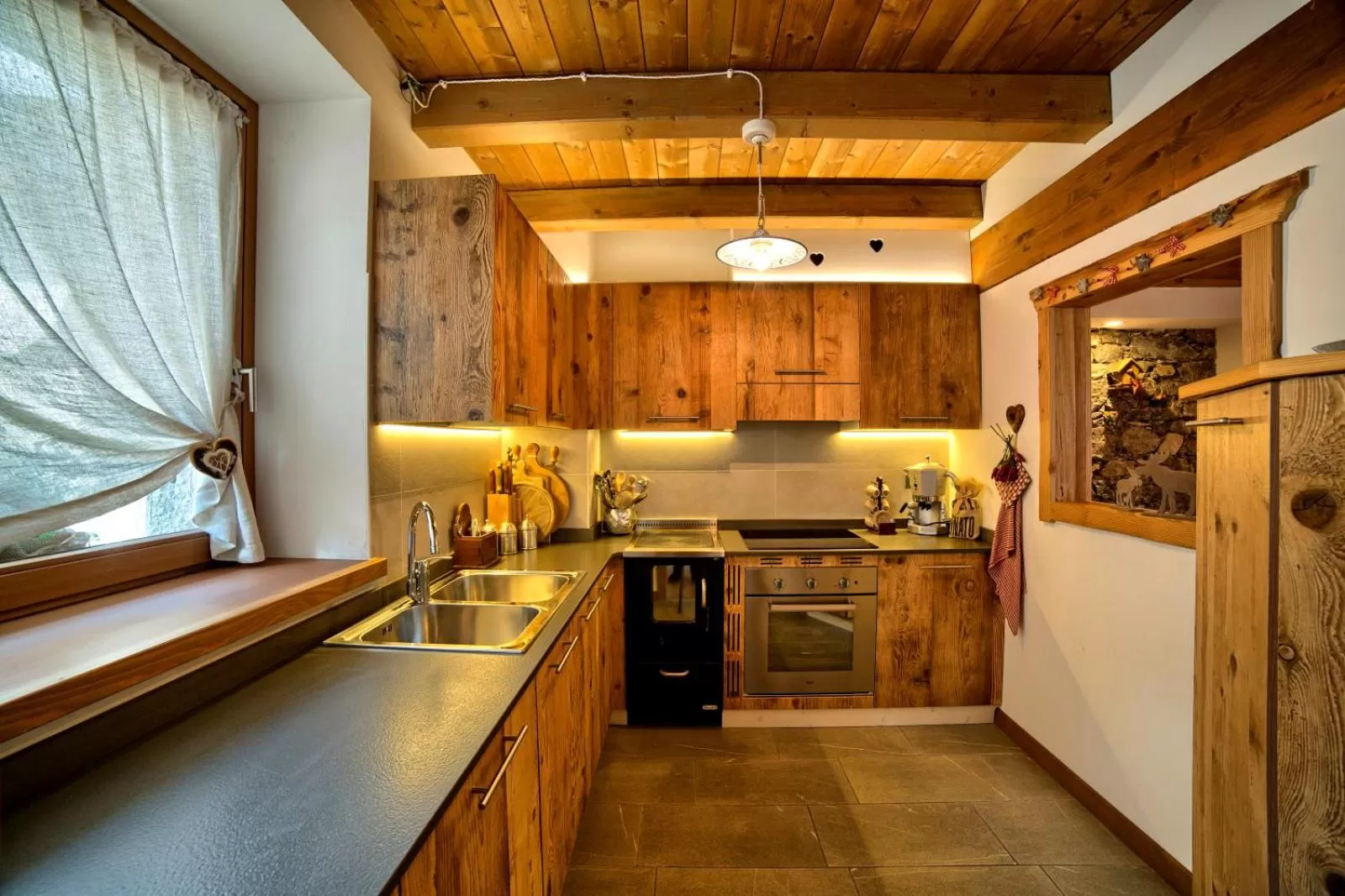 Kitchen or kitchenette in Albergo Diffuso Tolmezzo